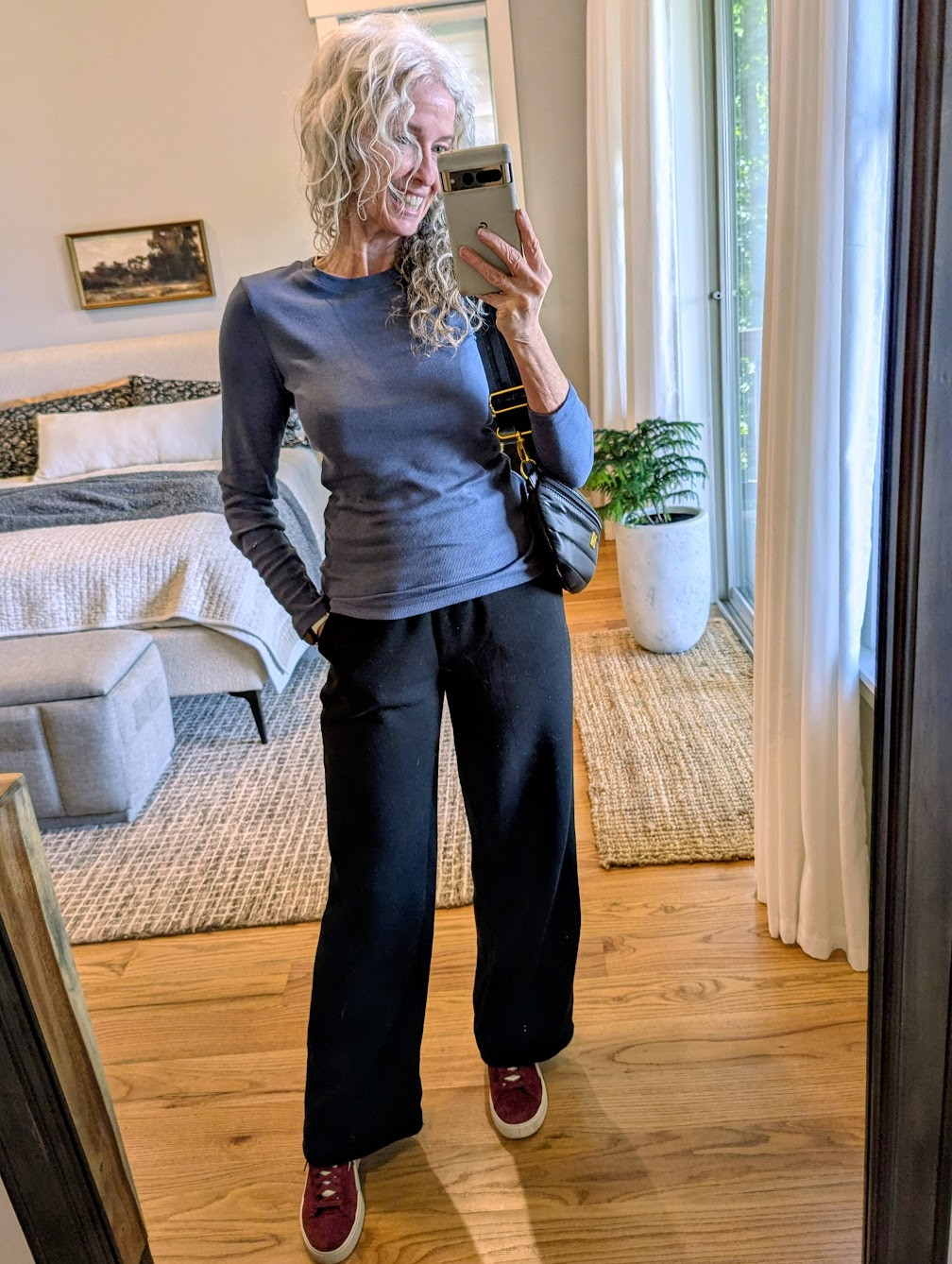 My go-to long-sleeve tee is on sale for just $12! I love it so much, I own it in a whopping seven colors. It's perfect for layering under vests and jackets, but also super stylish on its own. I'm wearing a size XS. #over60 #casualover60 #over50 #over60style 

 #LTKFallSale #LTKSaleAlert #LTKFindsUnder50