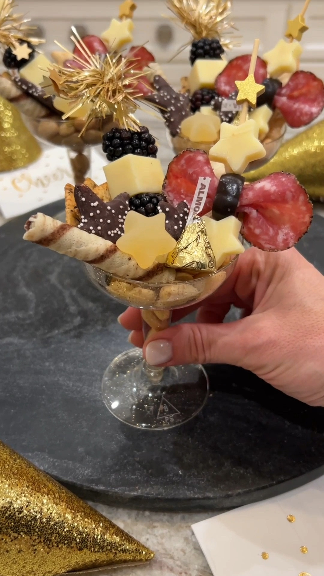 New Year's Eve Charcuterie Coupes 🍾🧀 Champagne coupes filled with festive charcuterie and snacks are the perfect appetizer for your guests to walk around and mingle with at the party. 

#LTKHoliday #LTKfoodie #LTKSeasonal
