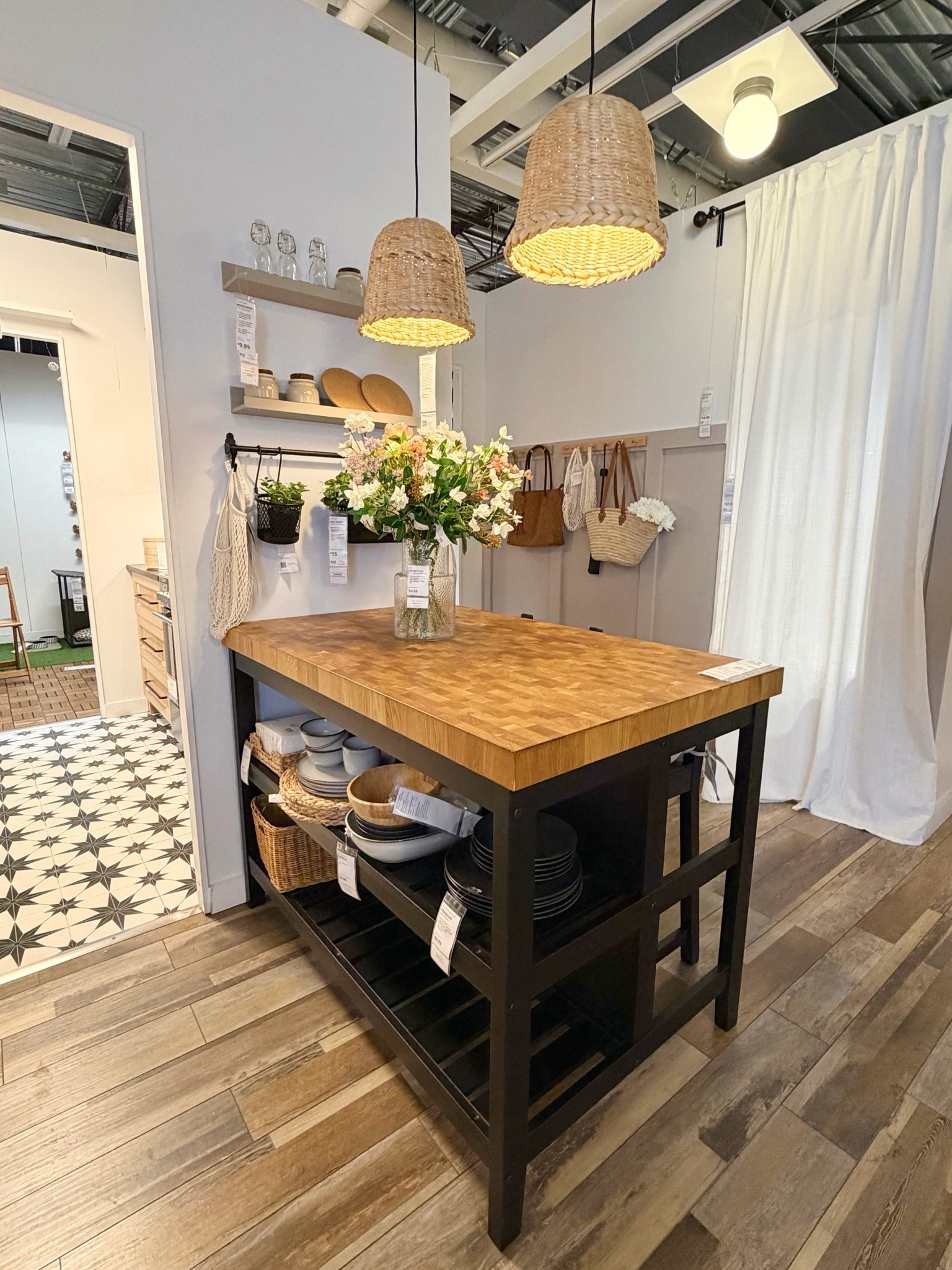 Such a great kitchen island option from IKEA! 🖤 The highly rated VADHOLMA Kitchen Island has a substantial, high-quality look with its beautiful oak top, classic black finish, and spacious open storage.  ✨🍽️🥂 I love how it adds extra workspace and storage while bringing so much warmth and character to the kitchen—especially if you don’t have a built-in island! 🫶🏻 #Ikea #kitchenisland #kitcheninspo

#LTKHome #LTKSaleAlert