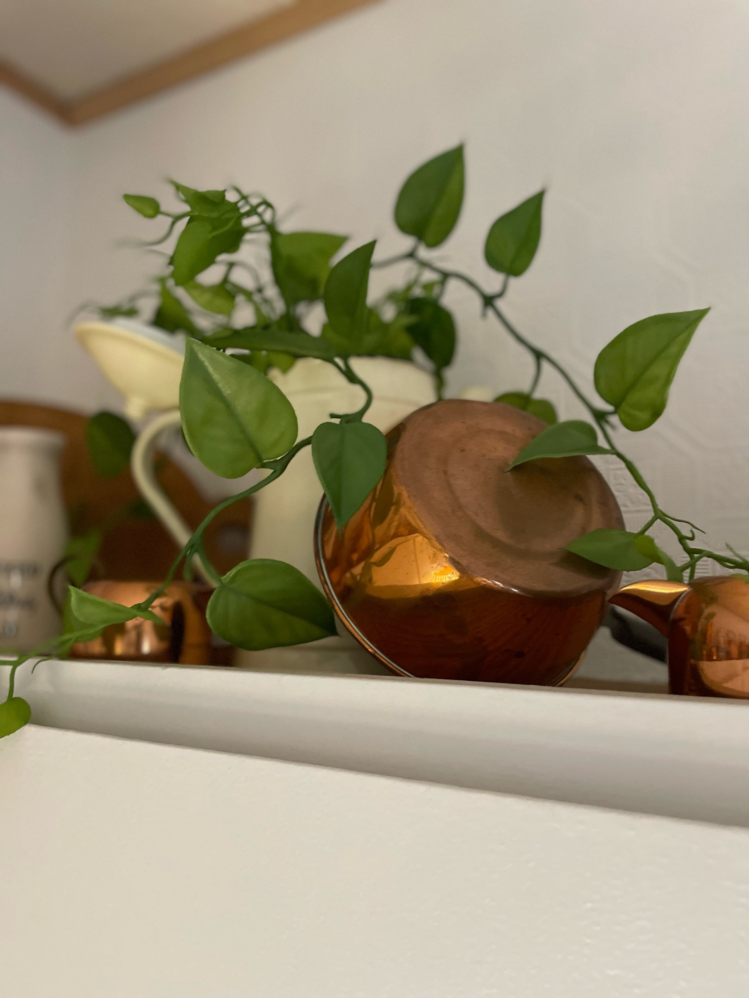 Want a cottage core look in your kitchen? 
Vintage decor, such as copper, enamelware, wooden utensils like cutting boards or mashers, and old glass bottles can help to accomplish that!

#LTKhome #LTKstyletip #LTKfindsunder50