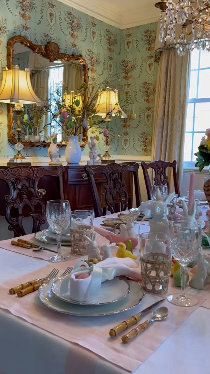 As I dive into creating this year’s tablescape masterpiece, I can’t help but look back at last year’s setup with a heart full of fondness. 🌸✨ Embracing tradition and elegance, we had pink and white table linens setting the stage, complemented by vintage white china and bamboo flatware that added a unique touch. The pink candles and napkins folded into the cutest Easter bunny ears you’ve ever seen brought smiles all around. Adding to the charm were crystal and rattan glassware for that sophisticated flair, while ceramic bunnies with their light green ribbon neckties added a dash of whimsy. 🐰💕 The table was alive with scattered Easter eggs and a vibrant floral arrangement in a wicker vase, making for an enchanting centerpiece. And let’s not forget the buffet, with its Easter bunnies and festive branches in a white ceramic pitcher adorned with hanging eggs. It truly set the scene for a joyous celebration. As I ponder over this year’s design, I’m curious - do you serve a meal on Easter or prefer going out? Share your traditions; I’d love to hear! 🐰🥕🌷🍽
.
#dressingthetable #eastertable #tablescapestyle #southernladymag #easterinspiration #traditionalinterior #thecollectedlook #inspiremehomedecor #settingthetable #entertainingideas #thenewsouthern #traditionalhomemagazine #myupcountrystyle #traditionalhomemag #mytradhome #springcenterpiece #thecottagejournalmagazine #springtable #playwithyourdishes #victoriamag #postitandsmile #betterhomeandgardens #preppygrandhome #eastercenterpiece #mycollectedhome #southernhomemagazine #entertainandcelebrate #housebeautifulhome #seasonalhome

#LTKSeasonal #LTKVideo #LTKhome