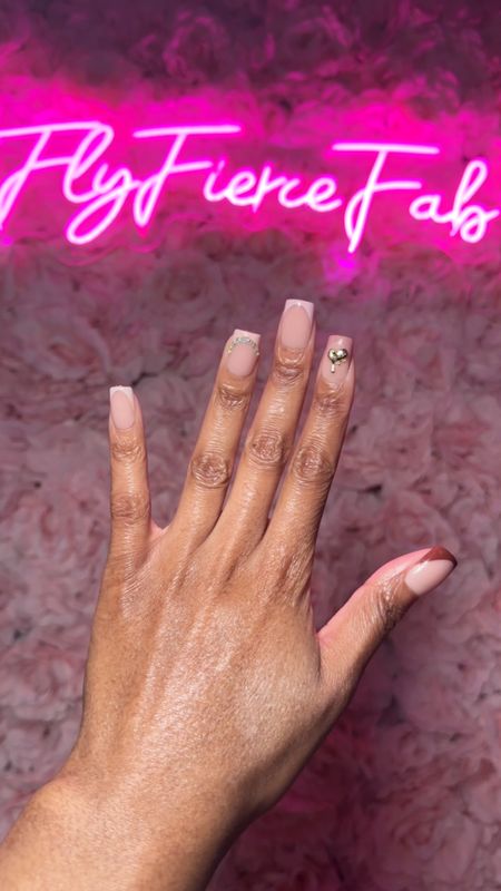 Not me making my own press on nails 🙌🏾😍, can you believe I got everything on Amazon?! And the nails and supplies were way cheaper than what it would be to get them done in the nail salon too.

I got a set of short, square, skintone shade, French tip, soft gel nails by BTArtbox on Amazon and they were so easy to work with 💅🏾✨. This set comes with five different shades, and you get 16 sizes. This exact set also comes in different lengths and shapes if you want to try something different.

I decided to customize the nails by adding nail charms and rhinestones, which I applied with rhinestone glue 💎✨.

After I cured the decorations on my nails under the UV lamp 💡 , I applied one coat of builder gel, and one coat of topcoat, and cured in between each polish.

Once the nails were finished, I just glued them on with my favorite nail glue from Sally’s which does not require curing at all, as it is regular nail glue.

I love how nails came out! 😍 And I’ll definitely be buying more in the future so that I can customize those as well.

I wanted to try gel nails, but I don’t want to put my hands under the UV lamp all the time so I decided to try making nails that I could just glue on after.

#LTKfindsunder50 #LTKVideo #LTKbeauty