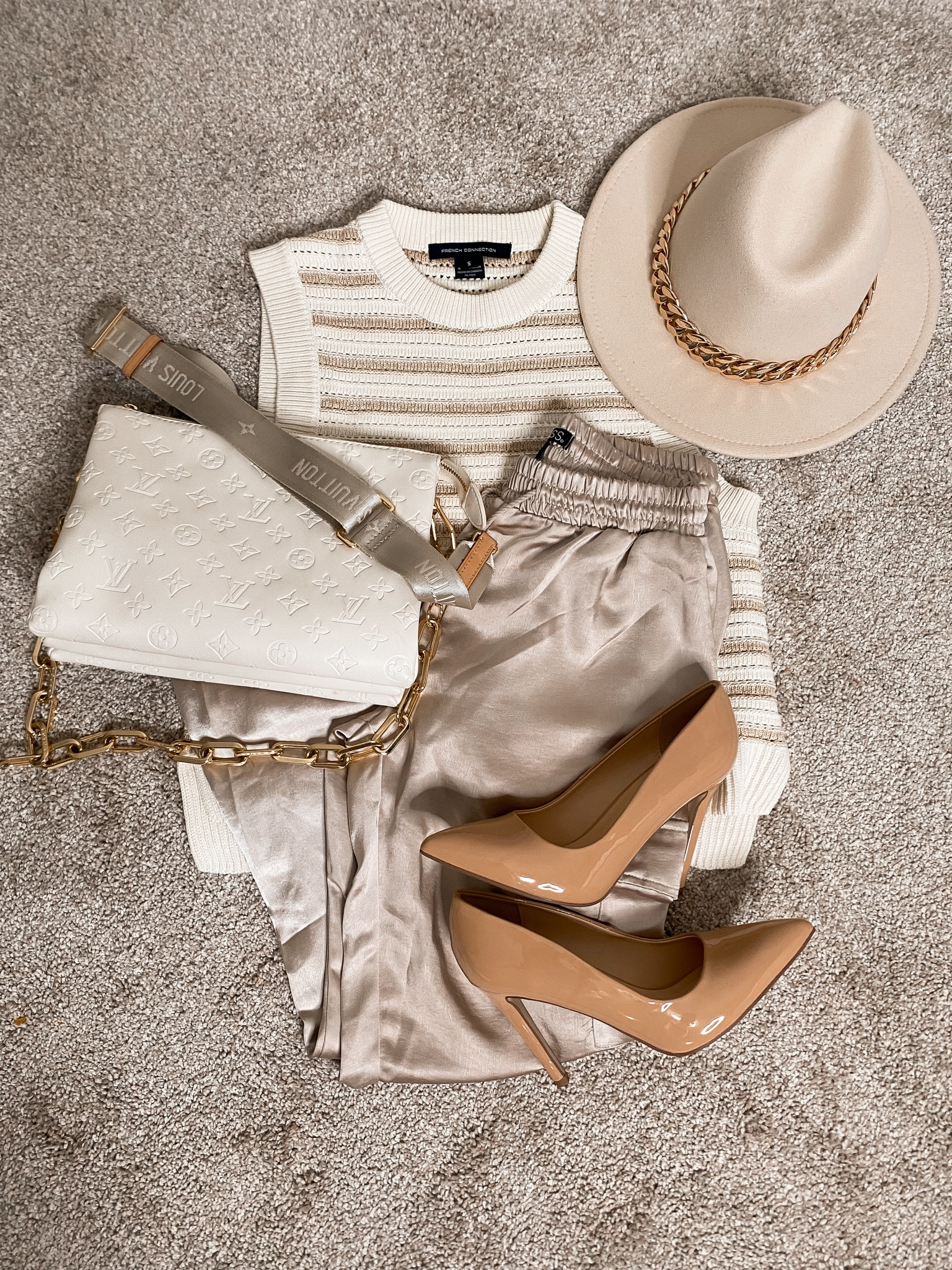 This is a way to dress up this sweater tank. Such a fun versatile top! 

#LTKStyleTip #LTKSeasonal