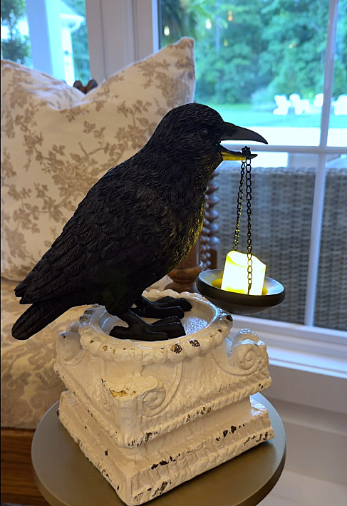 I love the character of this candle-holding crow. It was the perfect addition to this year's Fall home decor.  

 #LTKSeasonal #LTKHome