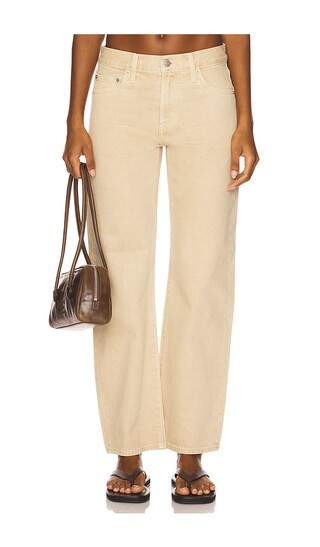Lexi Mid Rise Bowed Straight in Sand Dollar | Revolve Clothing (Global)