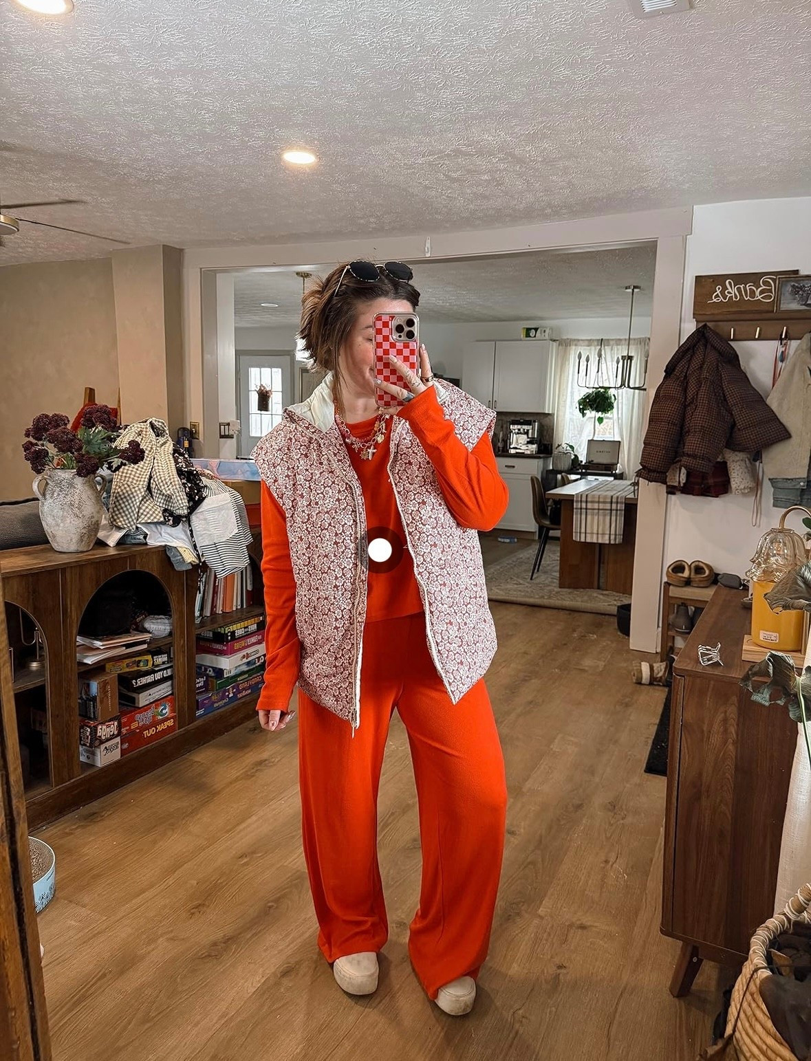 Vibrant floral puffer vest perfect for early spring! Paired with this adorable bright red orange two piece set. 5’1 size 8/10 wearing medium in set & small in puffer!

#LTKSeasonal #LTKMidsize #LTKootd