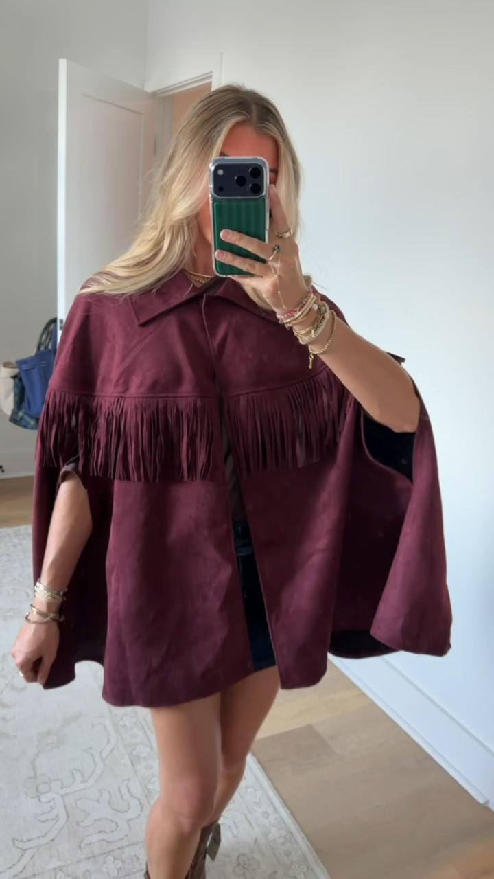 Walmart size s/m Wrap yourself in effortless sophistication with this Faux Suede Fringe Cape from Scenario. The soft, drapey finish gives it a luxe, suede-like feel, and long fringe trim adds movement and a touch of boho elegance. Designed for easy layering, it slips over sweaters, long-sleeve tops or dresses to elevate your look without added bulk. A versatile statement piece that transitions seamlessly from day to night. Only at Walmart.