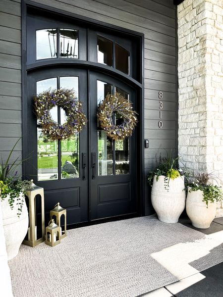 My front porch is finally here. I love the new lighter colored planters I swapped to this year. The wreaths are a natural dried, and stunning with my purple flowers I did  

#LTKSeasonal #LTKHome
