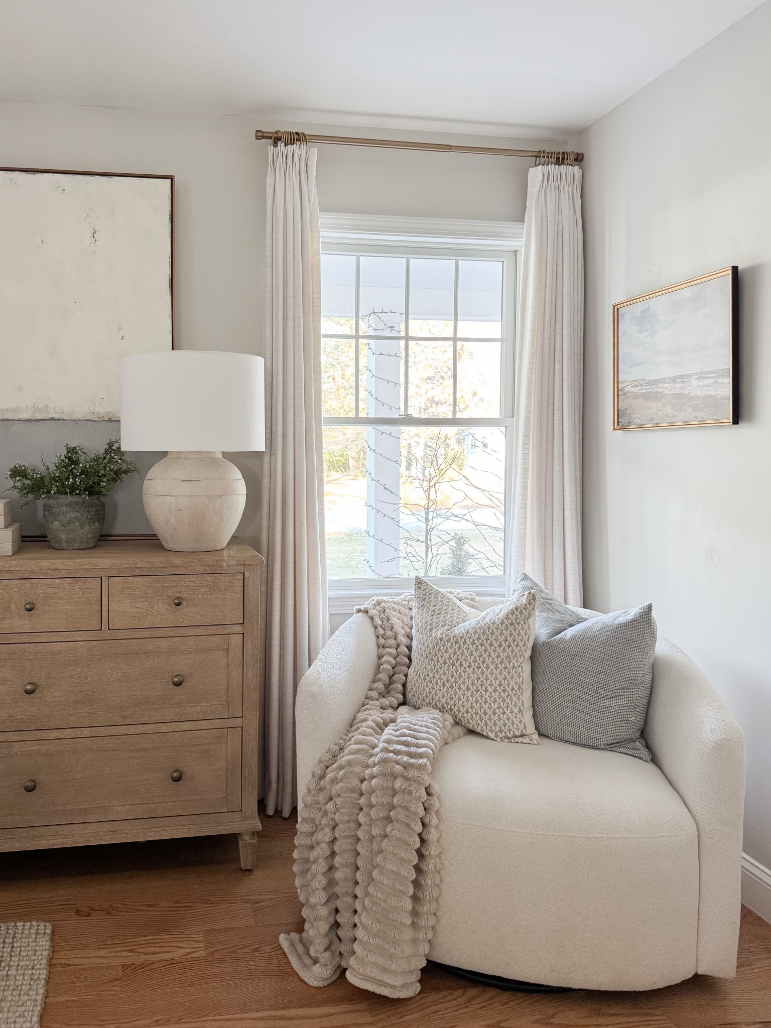 Light wood furniture styled with ceramics and greenery brings warmth and balance to the bedroom. coastal bedroom furniture, wood dresser styling, neutral home decor, coastal interiors, bedroom styling ideas, timeless bedroom, natural textures, home inspiration, sherricalnanhome

#LTKHome #LTKFindsUnder50