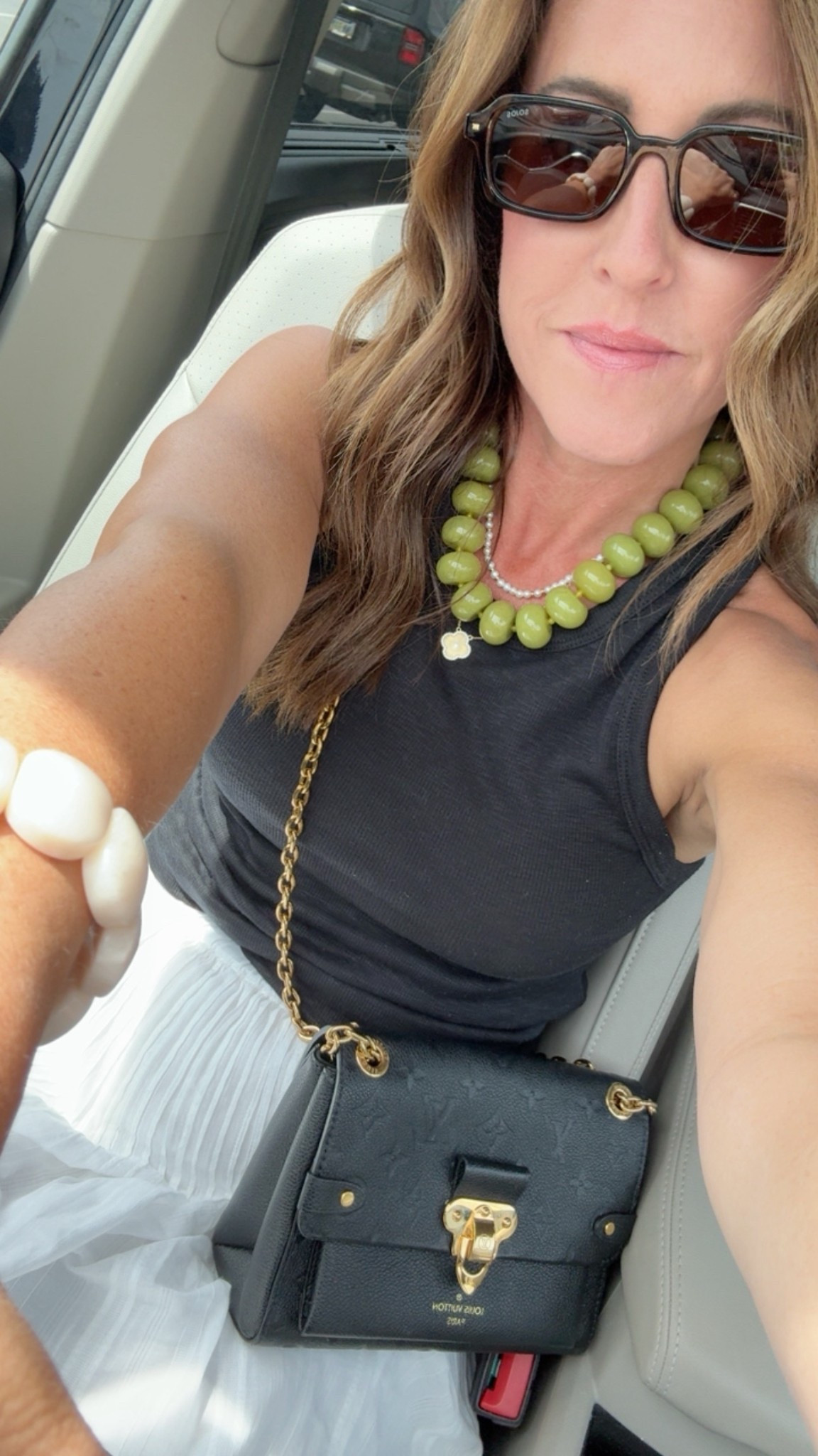 Monday errands 
Warm weather chic in this white midi skirt. Size down. Xxs here 
Borrow a designer bag! First month FREE code: TWOPEAS at Vivrelle  

#LTKOver40 #LTKmomlife #LTKootd