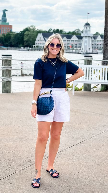 Just a girl posing in front of the fake beach. Small tee (amazingly smooth and polished) and these linen shorts are just lovely.  The mediums have a little room but the smalls feel too tight. These are mediums  

#LTKstyletip #LTKfindsunder50 #LTKmidsize