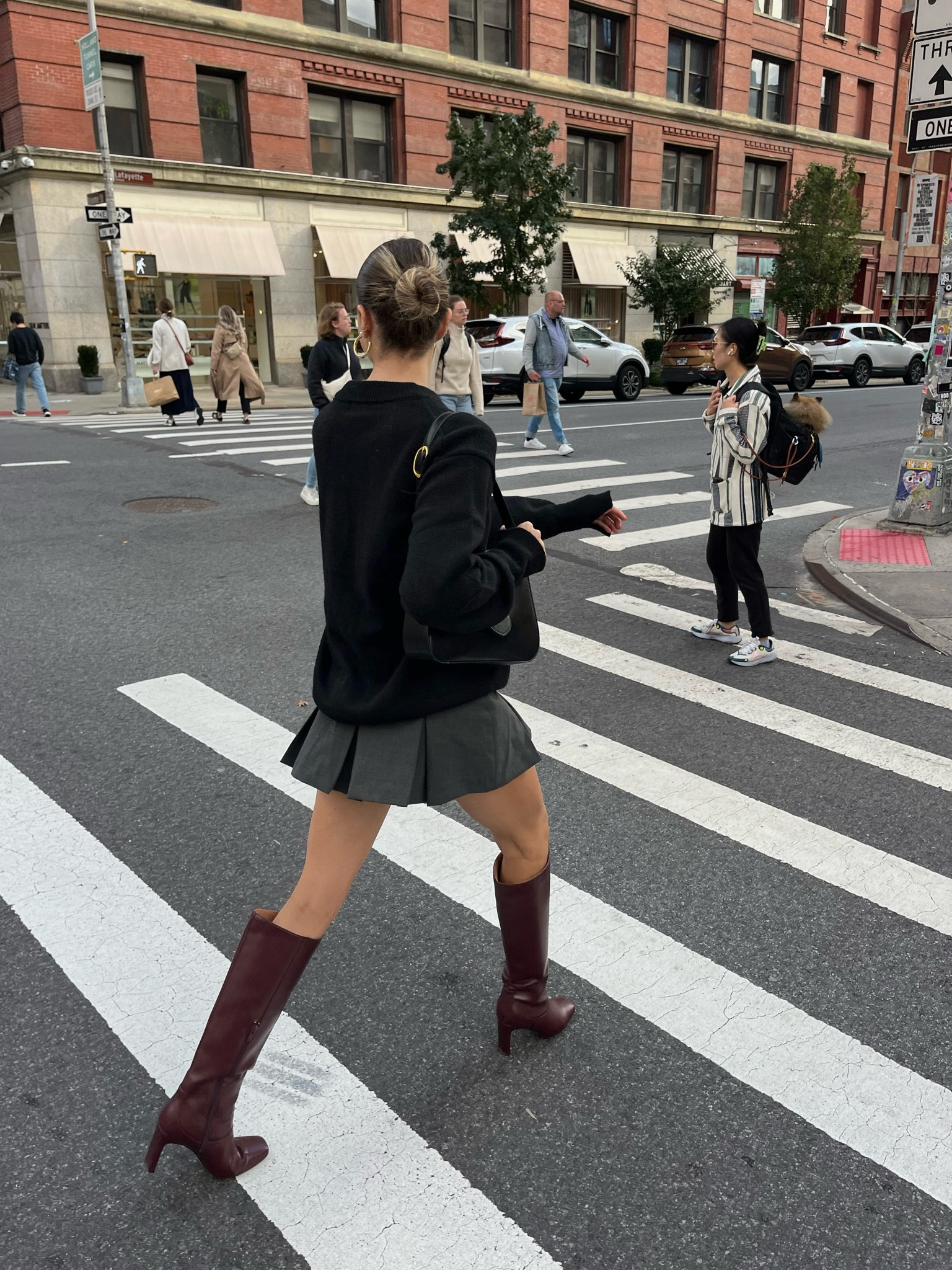 nyc fall day outfit. burgundy knee high boots, grey skirt, and black sweater🫶

#LTKfindsunder50 #LTKshoecrush #LTKstyletip