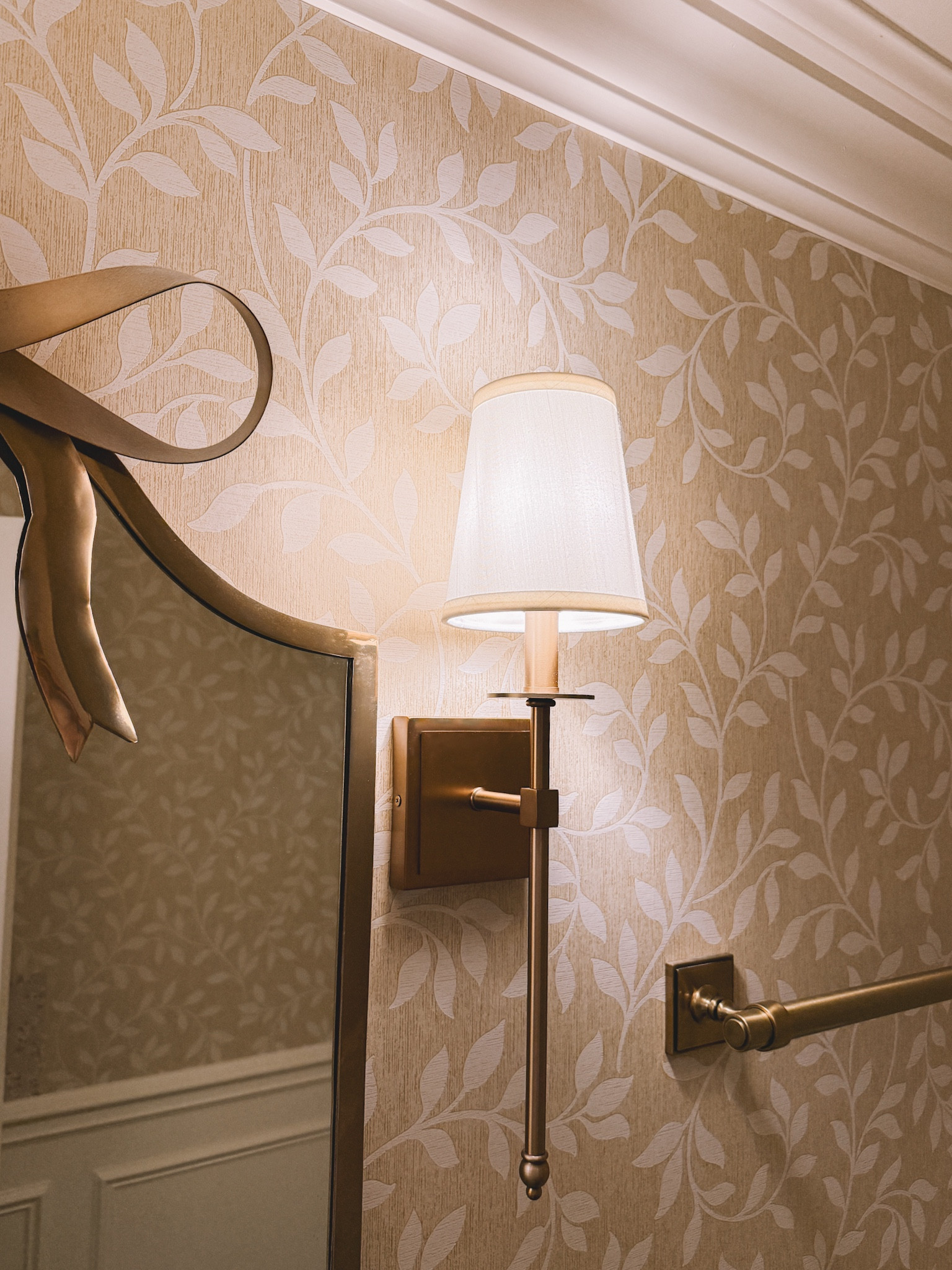 This is a little corner of our powder room, off the living and dining rooms. It's another cozy spot, and these very affordable @Wayfair sconces bring a lot of warmth to it. They really look like they cost SO much more than they do! We've had them for several years now and they've held up so well. #wayfair #wayfairpartner

#LTKHome