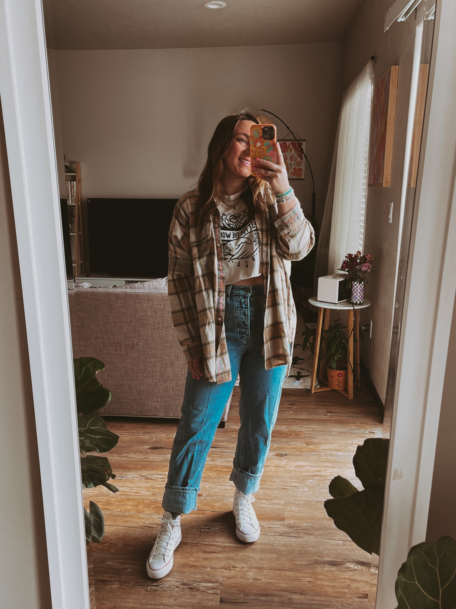 Oversized beach flannel shirt 
Dad jeans
Comfy casual midsize outfit 
White sneakers #competition
Floral phone case
Graphic tee


#LTKunder100 #LTKstyletip #LTKFind