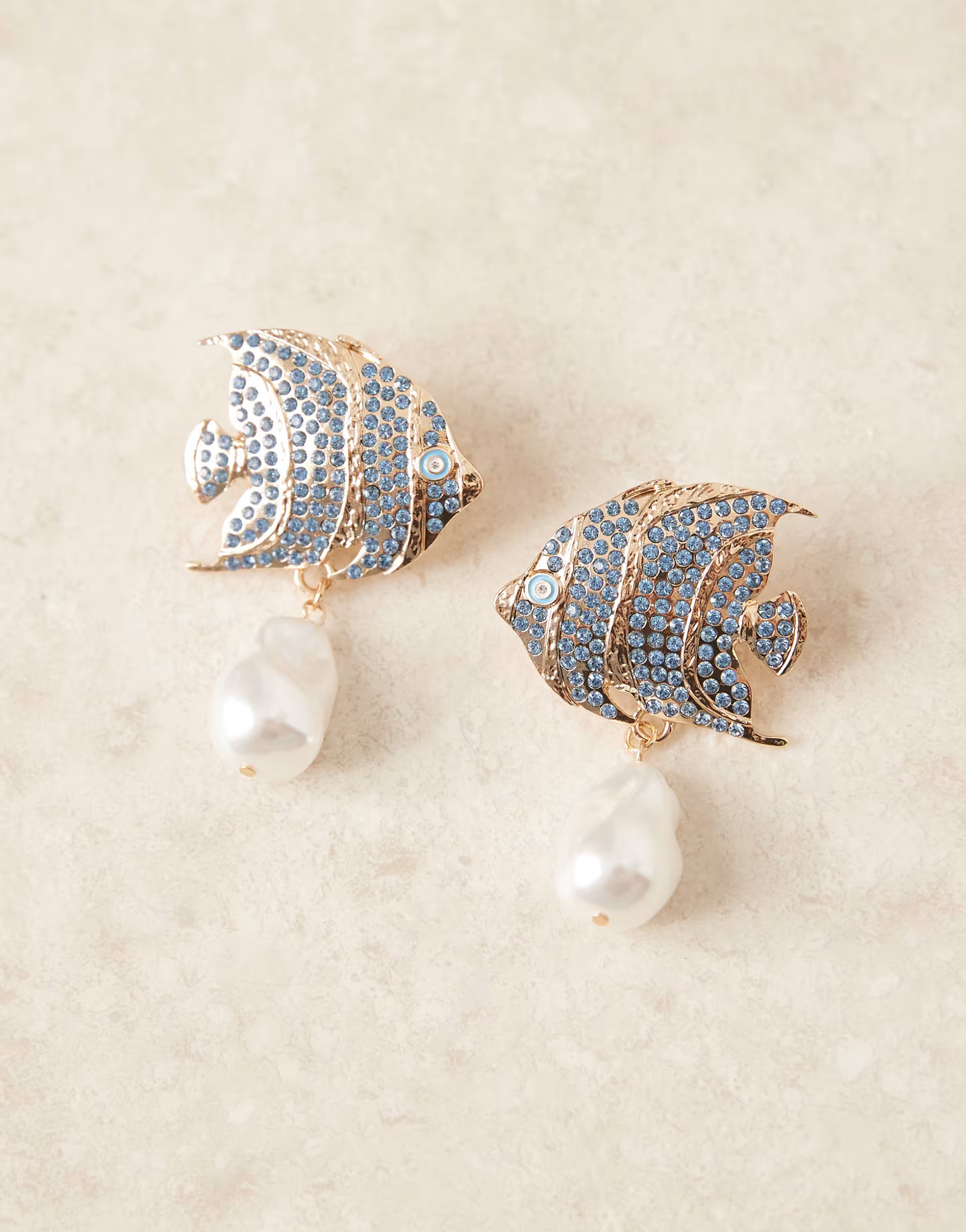 ASOS DESIGN Limited Edition crystal fish stud earrings with faux pearl drop in gold tone | ASOS (Global)
