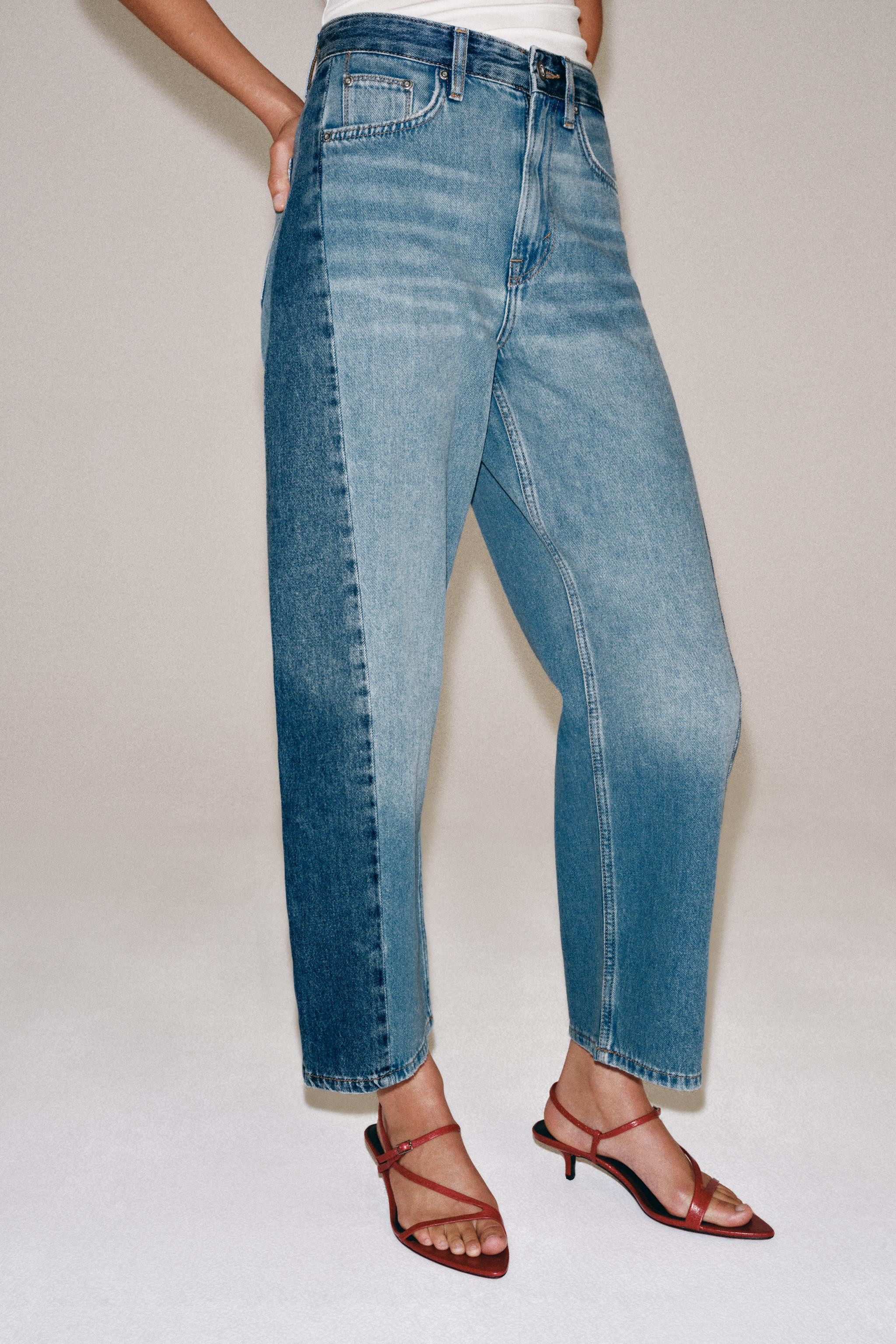 ZARA WOMAN COLLECTION Mid-rise jeans featuring belt loops and five-pocket styling. Contrasting de... | Zara US