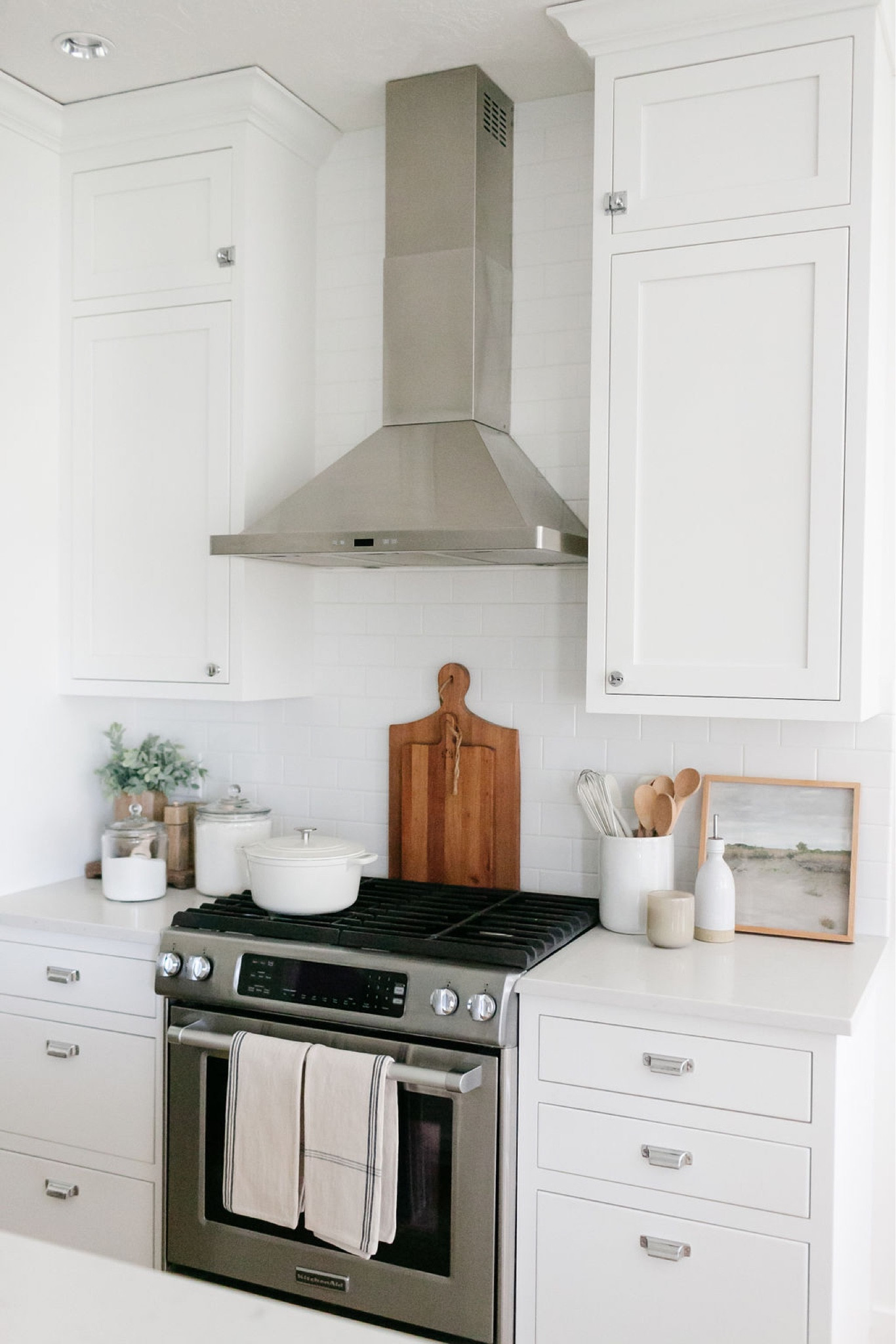 In my small kitchen I love to use functional decor like wood cutting boards, glass canisters, pretty olive oil bottle, dish towels. 

#LTKstyletip #LTKhome #LTKSeasonal