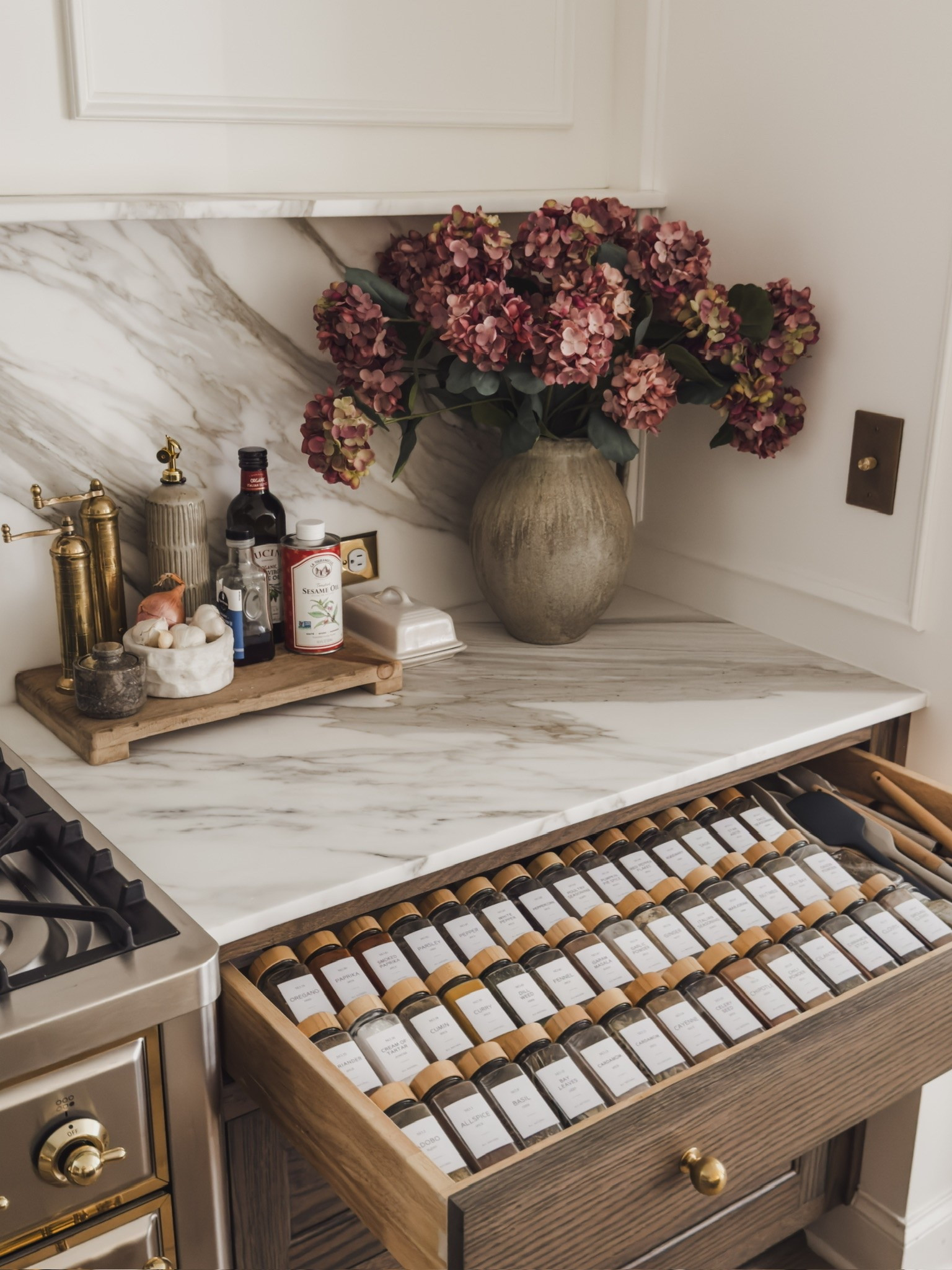 I always love a great organization find and this spice drawer is no exception! From clear jars with wooden lids and aesthetic labels, creating an aesthetic and functional kitchen has never been easier.

Home finds, neutral home inspo, kitchen details, organization finds, spice drawer details, collected style, faux fall stems, countertop styling, functional kitchen decor, neutral wood tones, wooden riser, neutral vase, range details, fall refresh, Wayfair, Etsy, found it on Amazon, ILVE, McGee and Co, shop the look!

#LTKSeasonal #LTKHome