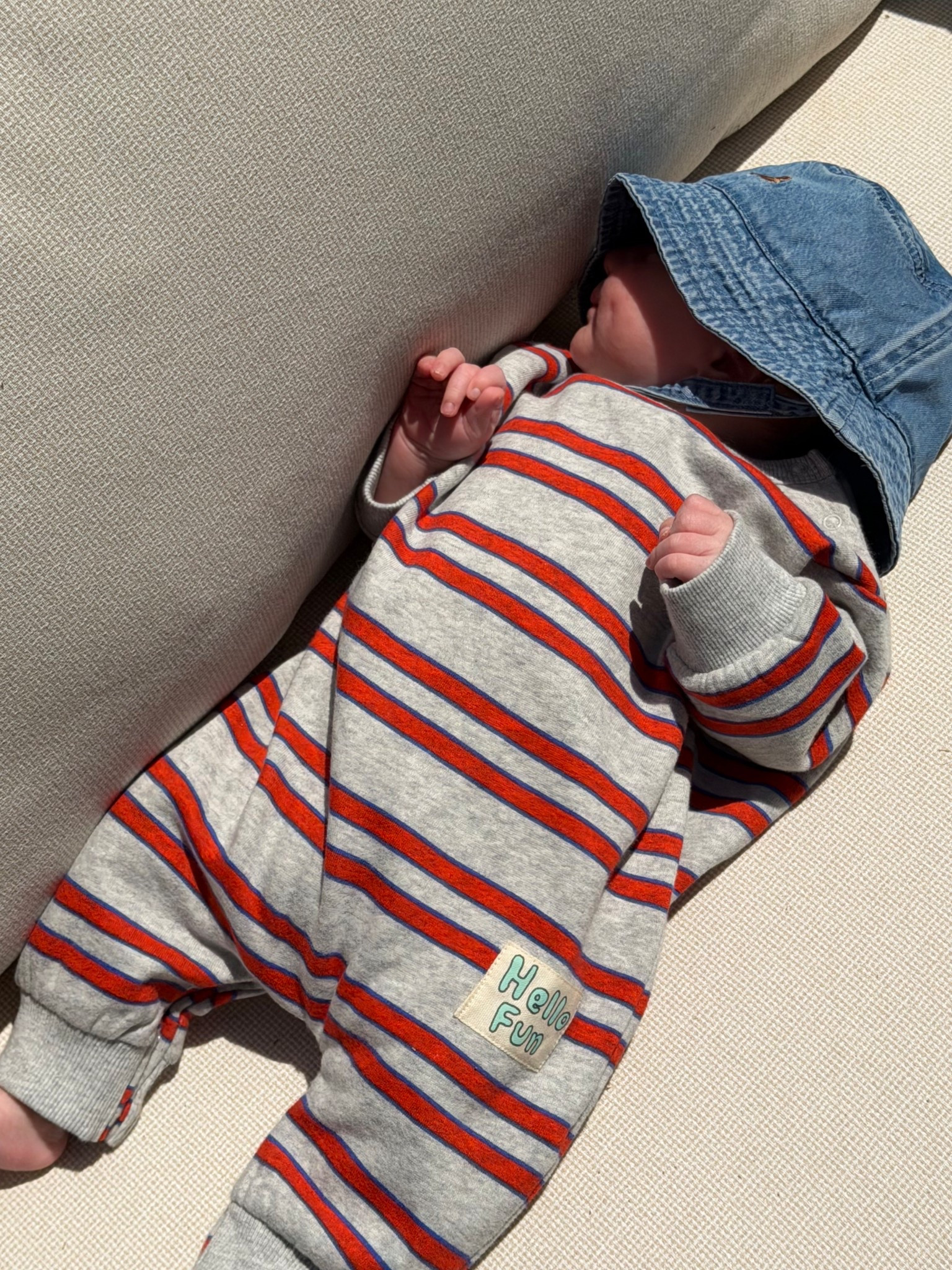 Striped onesie and bucket hathat