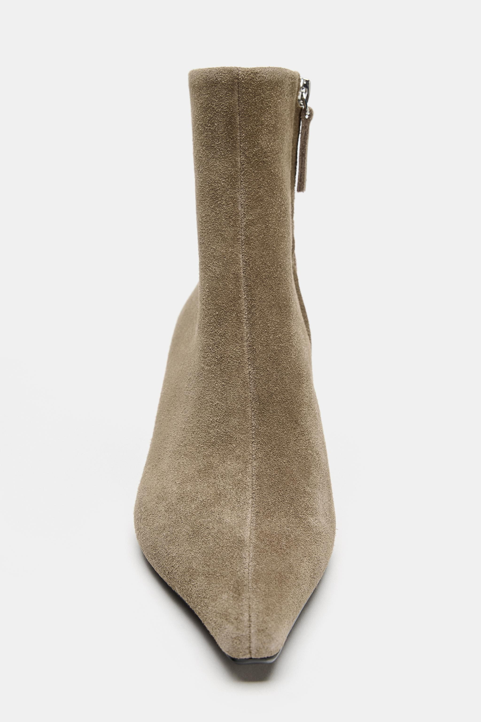 Suede ankle boot style shoes. Featuring topstitching detail on the front. Side zip fastening. Kit... | Zara US