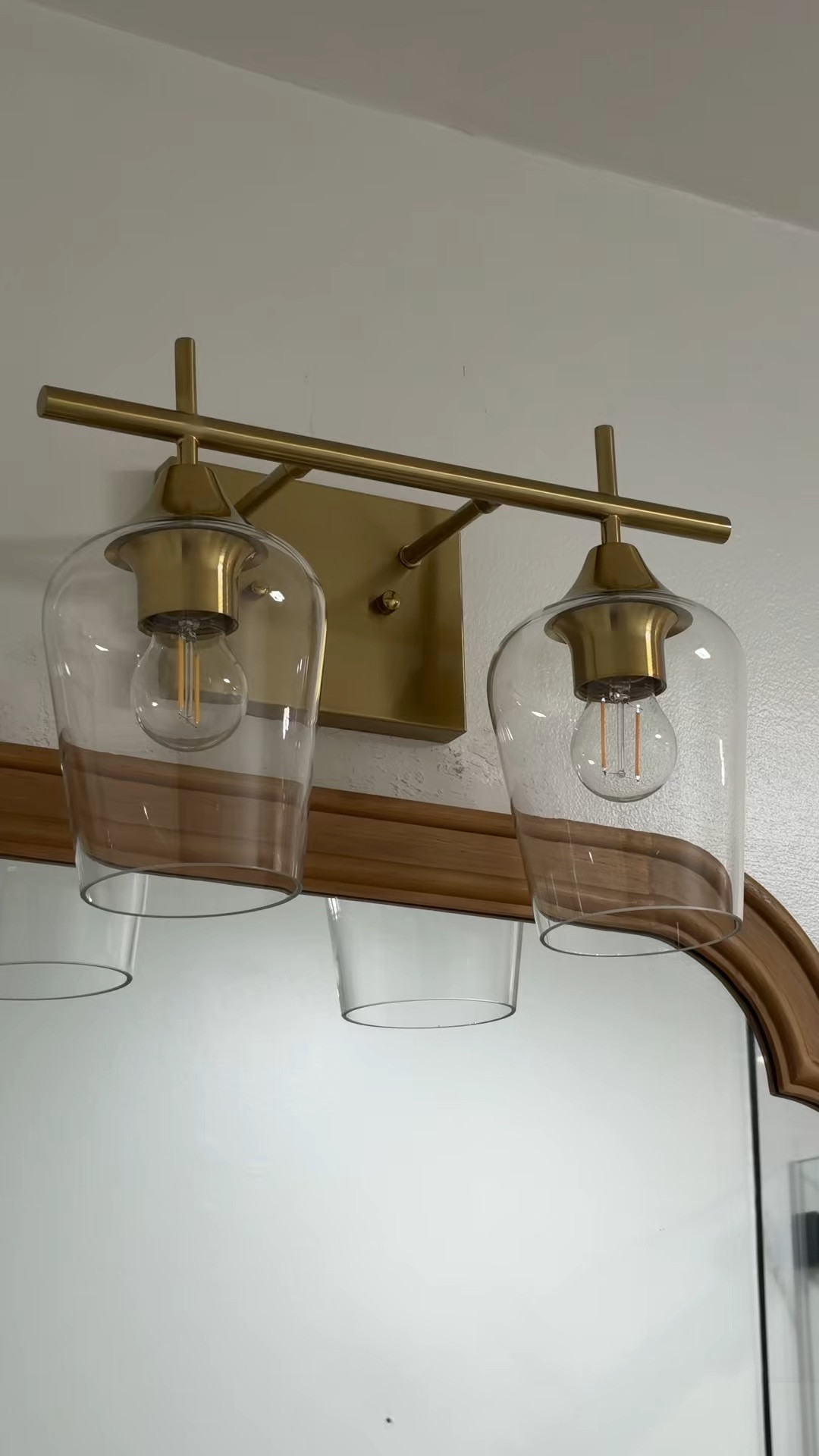 2 light vanity in brushed gold, I love the shape of these lights for any bathroom makeover! Modern without going to crazy! Also a prime day deal on Amazon!