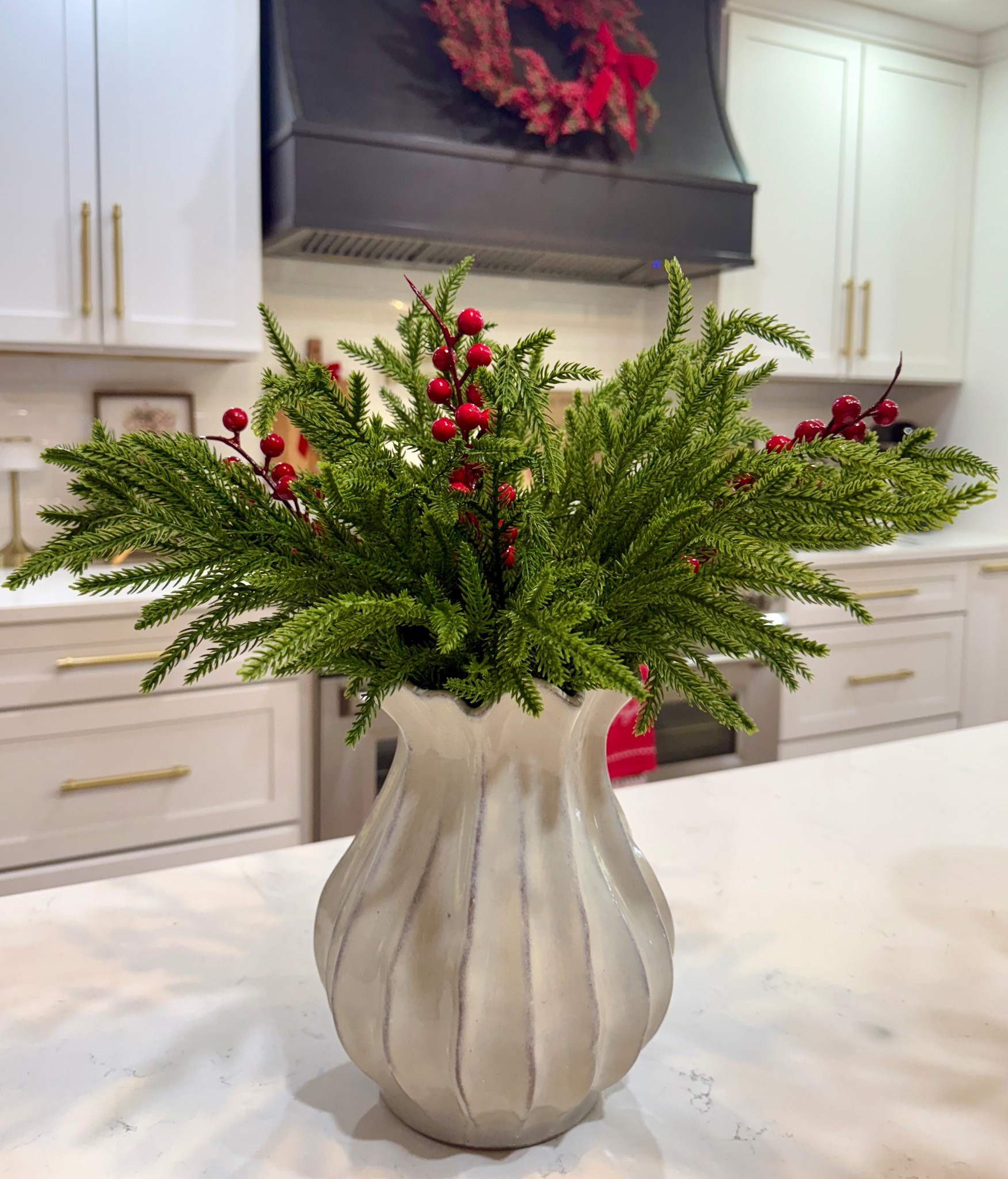 I love this viral pleated vase from Target Magnolia. 🎯 After Christmas I’ll change the stems. I know it’ll get good use year around! They also have a larger one and a light blue for spring. 🤍

#LTKSeasonal #LTKGiftGuide #LTKHoliday