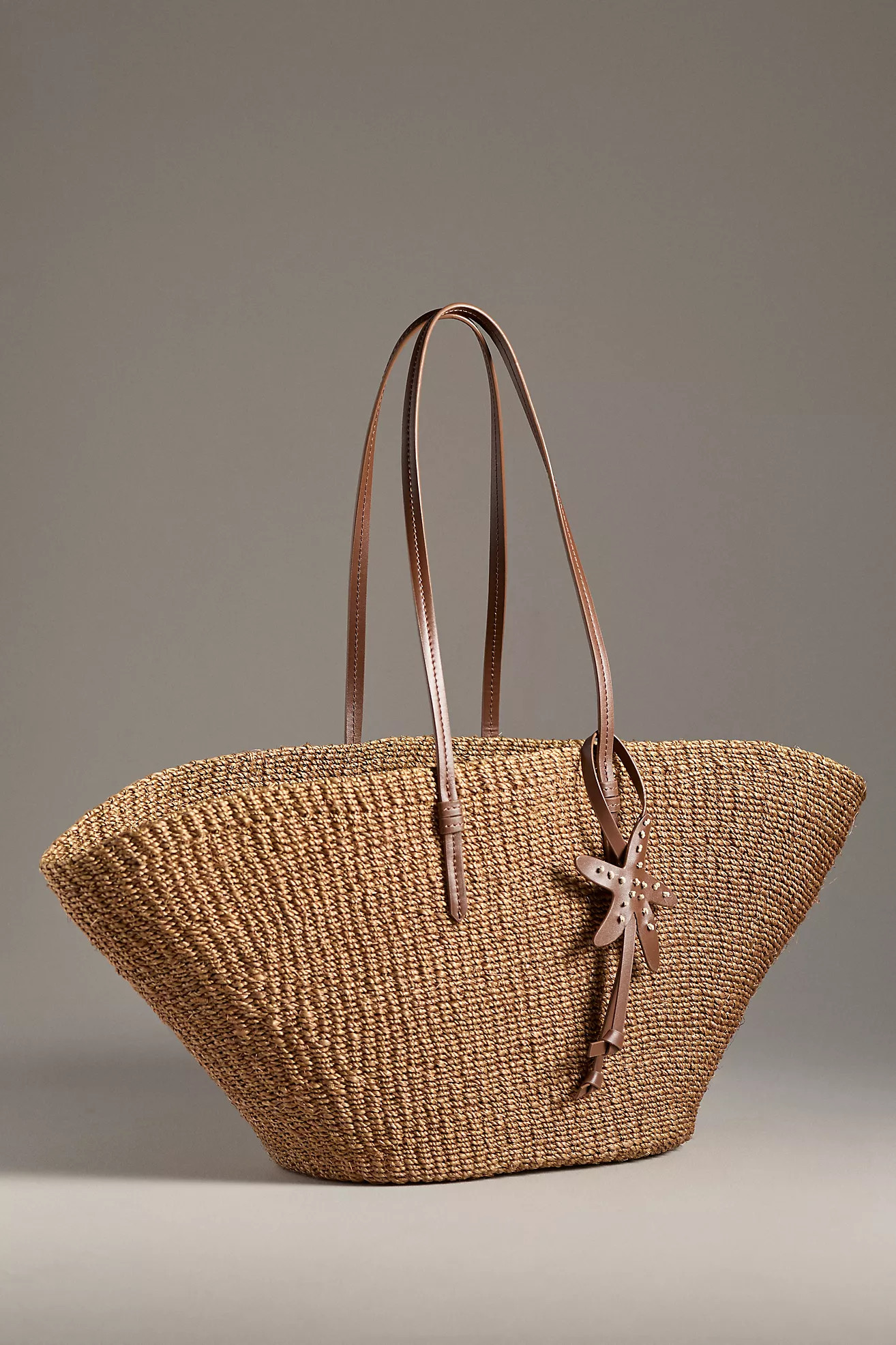 POOLSIDE The East West Raffia Charm Tote | Anthropologie (US)