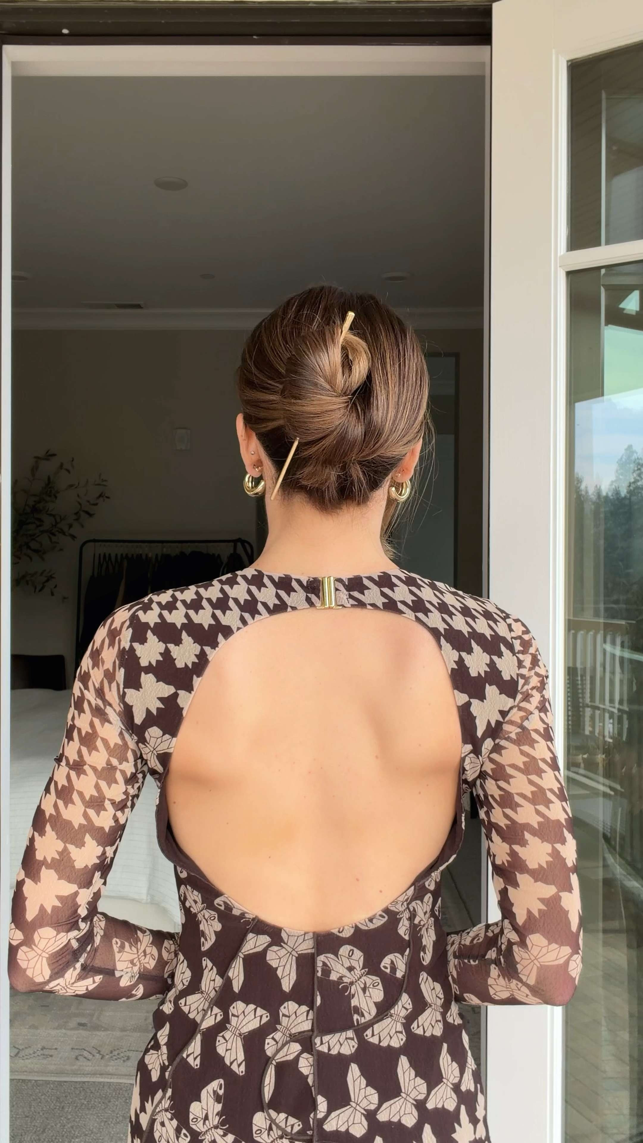 Hair Stick Knot 💁‍♀️

Gather your hair into a low ponytail. Slide a hair stick underneath, holding it horizontally. Wrap the ponytail over the stick once while rotating the stick counterclockwise until the pointed end faces up. Flip the stick toward your scalp and weave it back through the bun, letting the tip peek out at a slight angle.

A chic little knot that’s secure, effortless, and somehow looks way more complicated than it is ✨ 

 #LTKgrwm #LTKootd #LTKBeauty