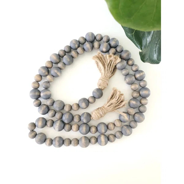 Beatrix Weathered Wood Bead Garland | Wayfair North America
