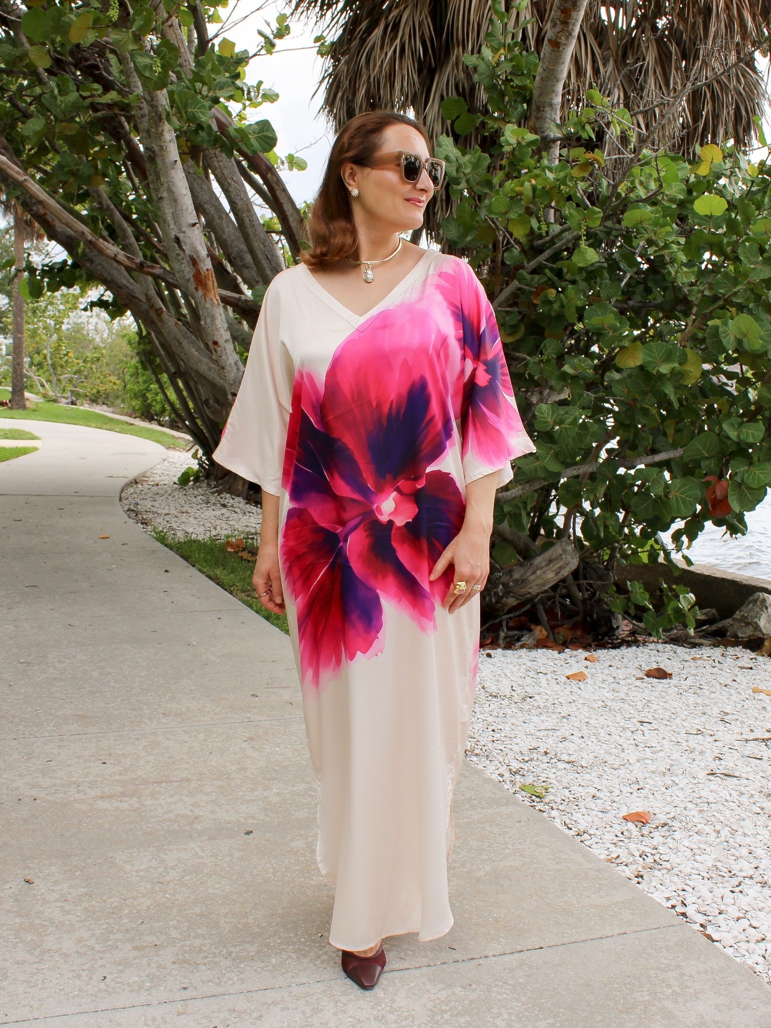 How stunning is this caftan dress? In wearing size small for reference. 
Linking this gorgeous pearl choker necklace and a very similar statement ring.