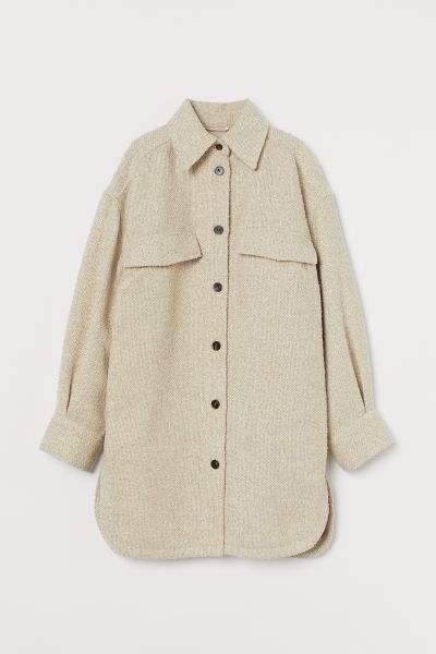 Long, relaxed-fit shirt jacket in a textured, woven fabric made from recycled polyester. Collar, ... | H&M (US + CA)