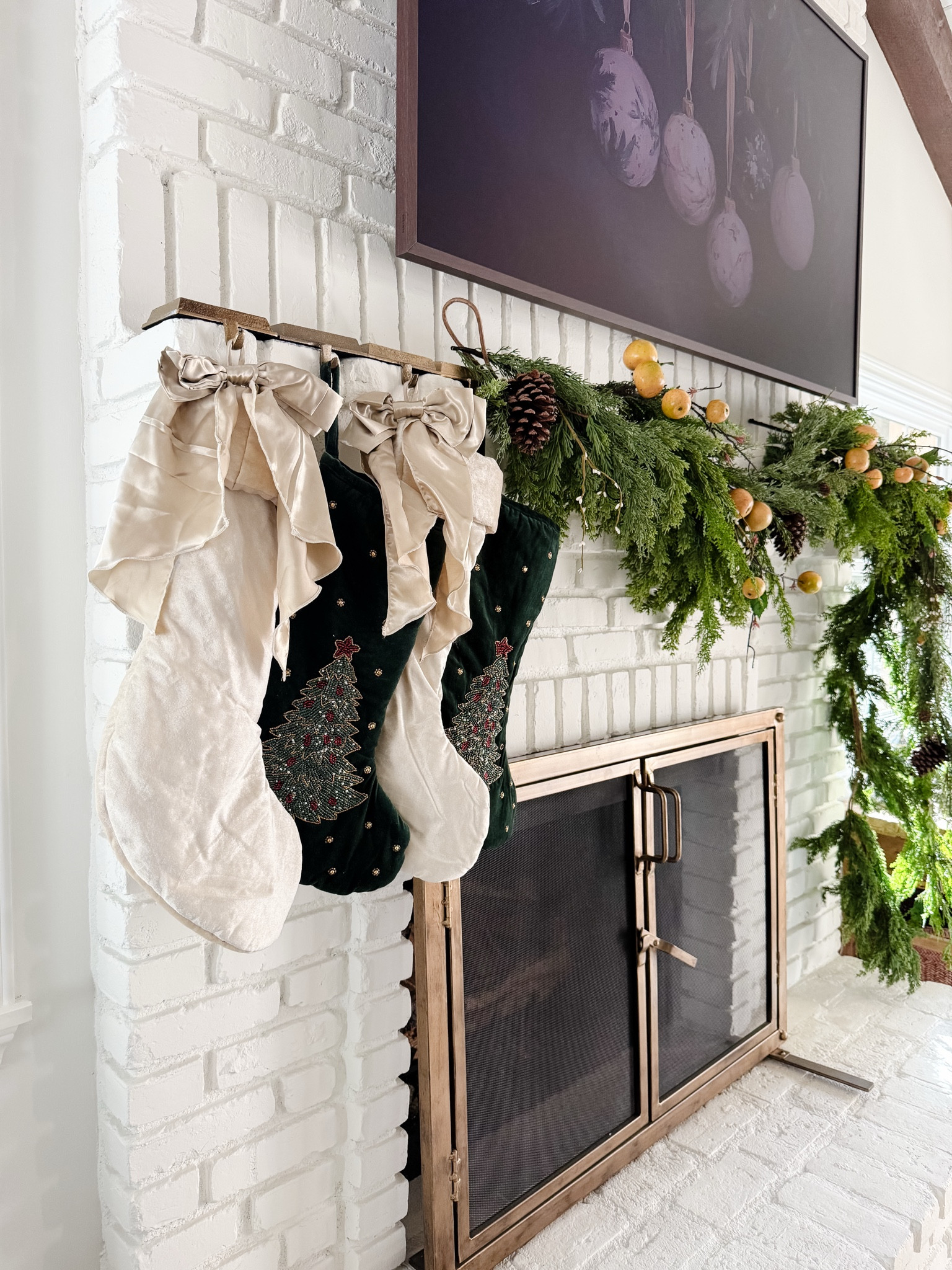 Found the green stockings this year at HomeGoods but linked a different green velvet ones available on TJ Maxx and Potterybarn.