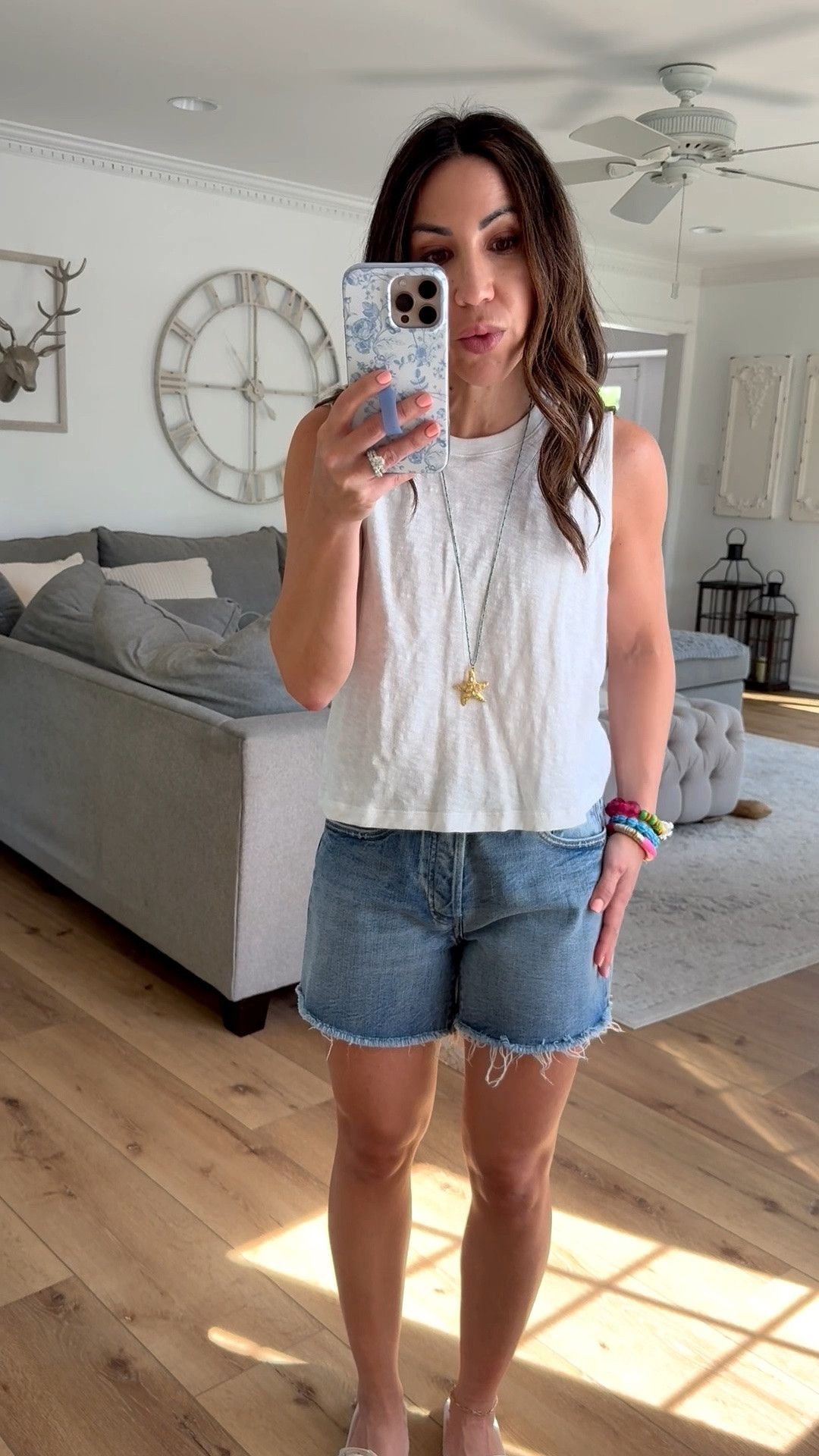 Code: BASIC20 thru 6/5. Denim shorts 25 but could’ve done a 24. White Tank XS.

#LTKOver40 #LTKSaleAlert