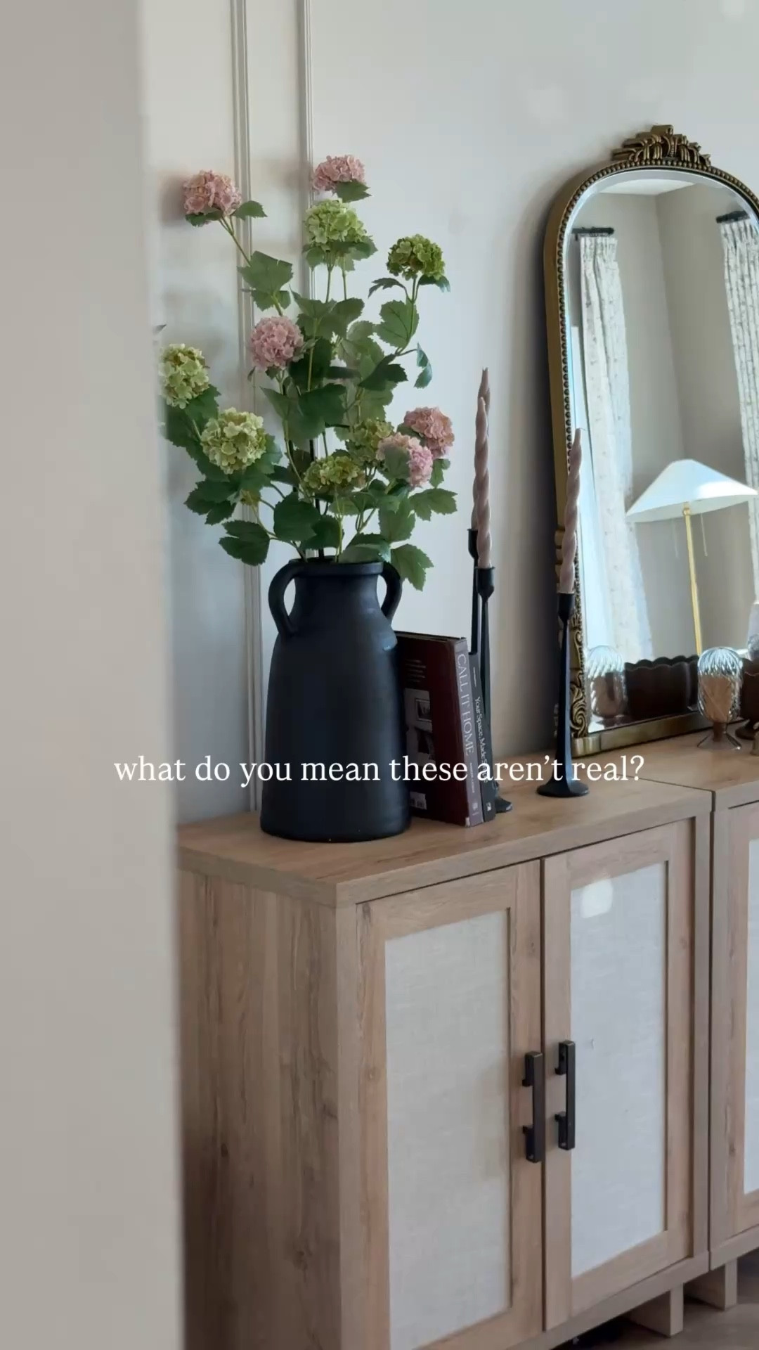 Never underestimate what a few faux stems can do for a space

#LTKSpringSale #LTKHome #LTKSaleAlert