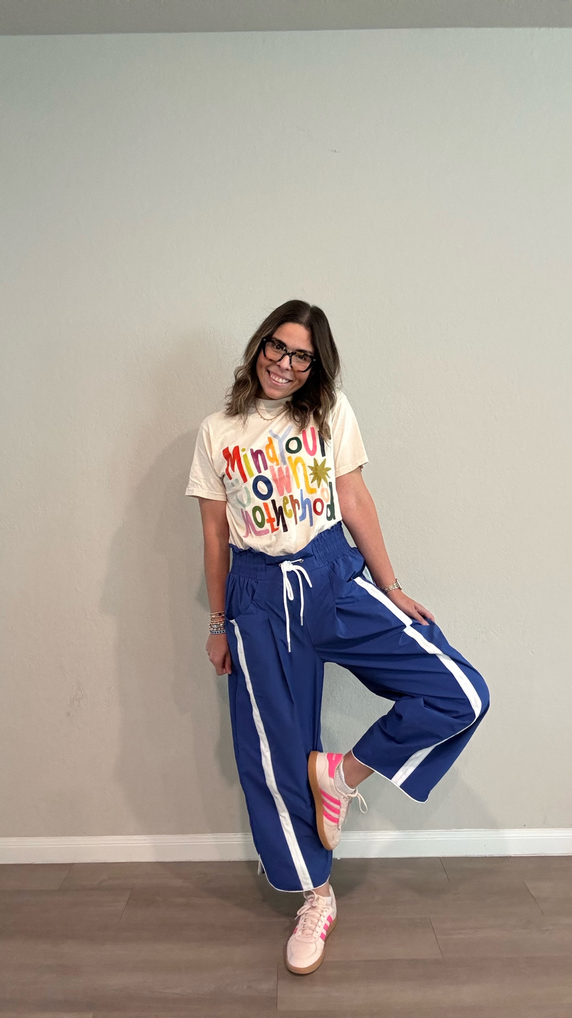 This “Mind Your Own Motherhood” tee is giving everything — and it’s the perfect Mother’s Day gift for the moms who say it how it is 🌈✨

Paired it with these blue wide-leg track pants (so comfy, so cute), my fave pink Adidas Gazelles, and called it a day 👟💕

Linked everything + similar options at every price point — from budget finds to boutique picks! 🛍️ Tap to shop before Mother’s Day 🌸

#ltk #ltkstyle #ltkshoecrush #ootd #mothersday #mothersdaygift #mindyourownmotherhood #momstyle #graphictee #adidasgazelle #casualstyle #momlife

#LTKMidsize #LTKootd #LTKMothersDay