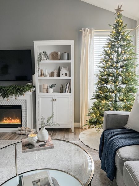 Neutral Christmas Home Decor with King of Christmas Alpine Fir Slim Tree 🌲✨




Neutral Christmas village, Christmas houses, neutral houses, white bookcase, built in shelf decor, glass coffee table, round coffee table, coffee table books, styling books, home decor books, white fireplace, mini trees 

#LTKHolidaySale #LTKSeasonal #LTKHoliday