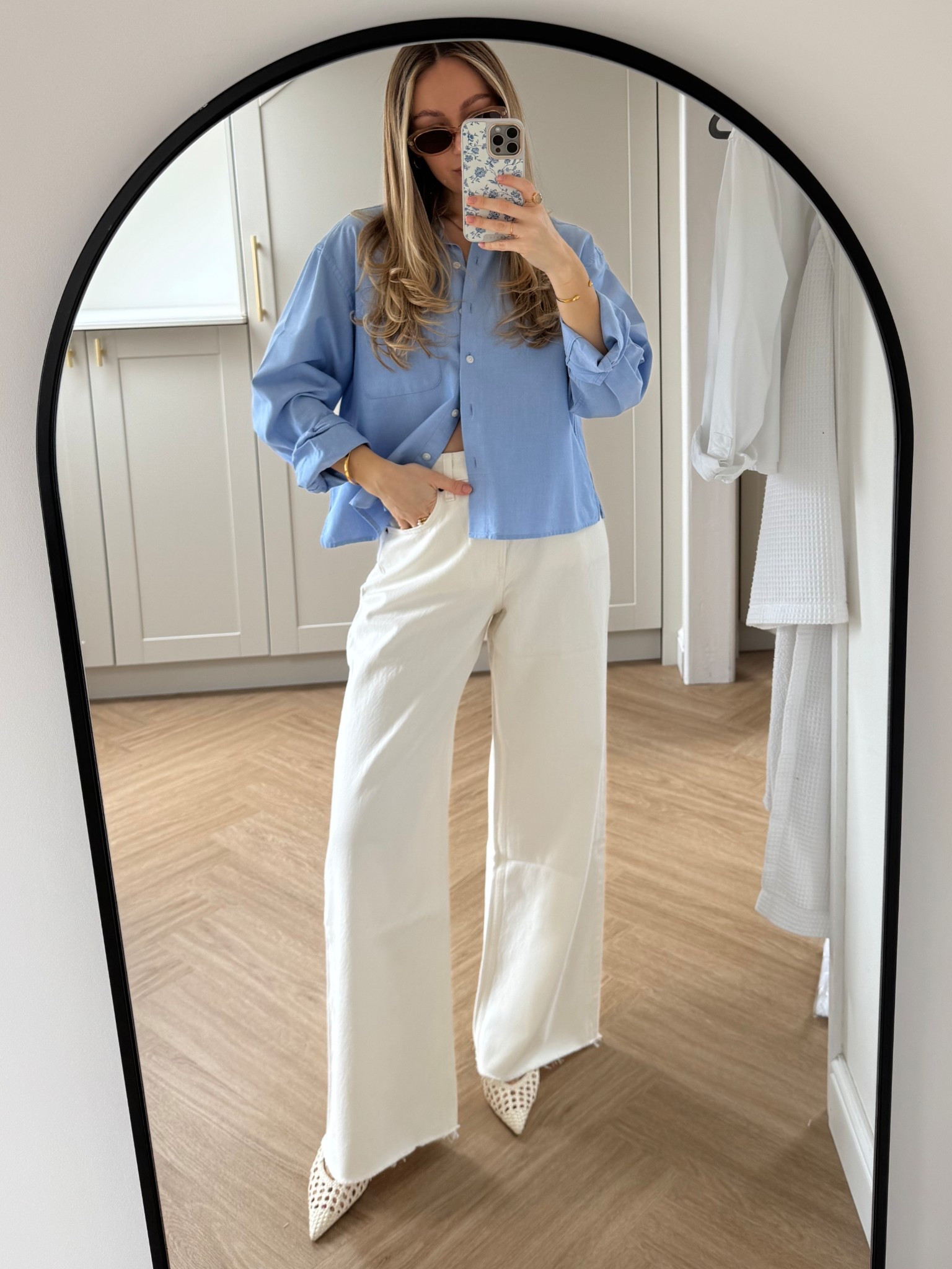 Spring outfit inspo - I loveeee a blue shirt paired with white denim 💙

#LTKspring