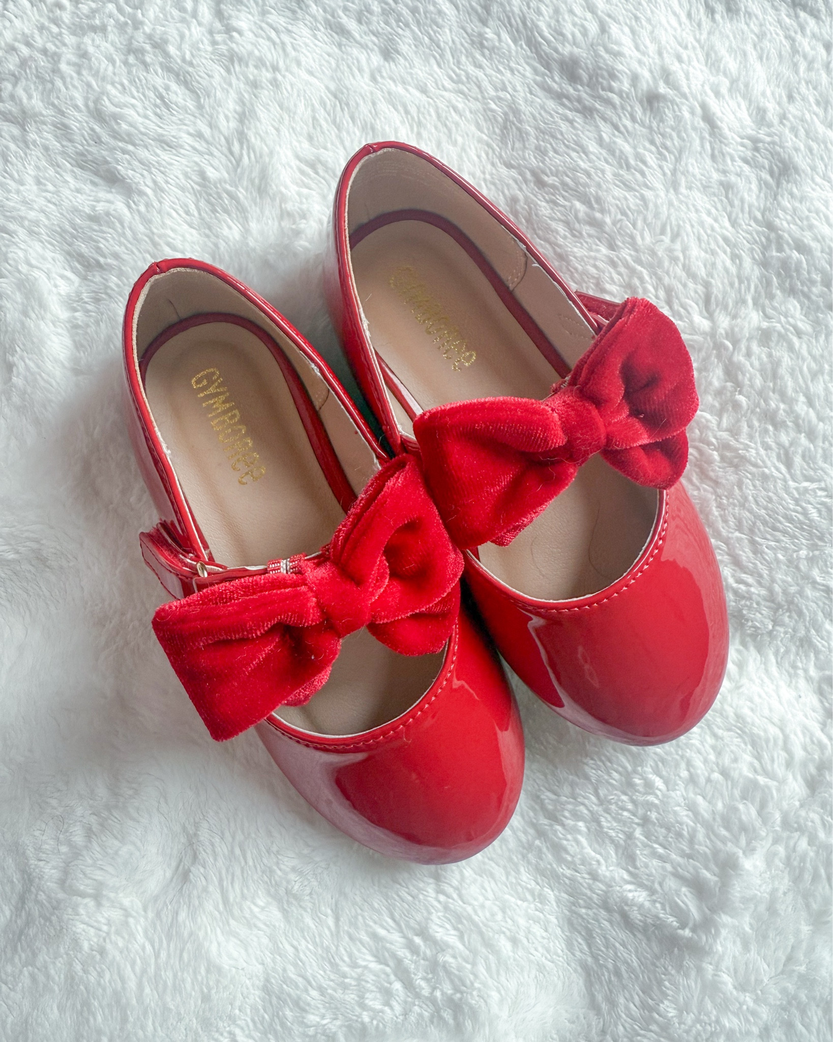 Red bow shoes, click any shoes below and go to the Gymboree tab, search for red bow shoes. 

#LTKHoliday #LTKKids #LTKGiftGuide
