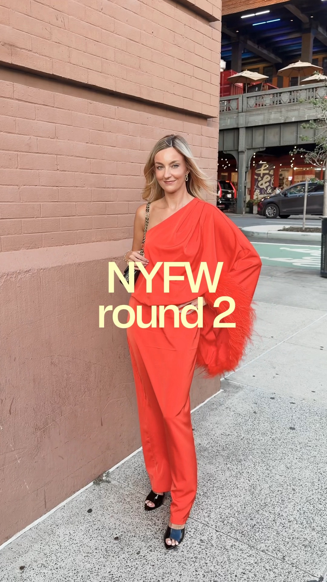 Wore this beauty to NYFW! Orange asymmetric dress @Club L London   wearing size 4!

Would be perfect wedding guest dress too!

#LTKNYFW #LTKWedding #LTKootd