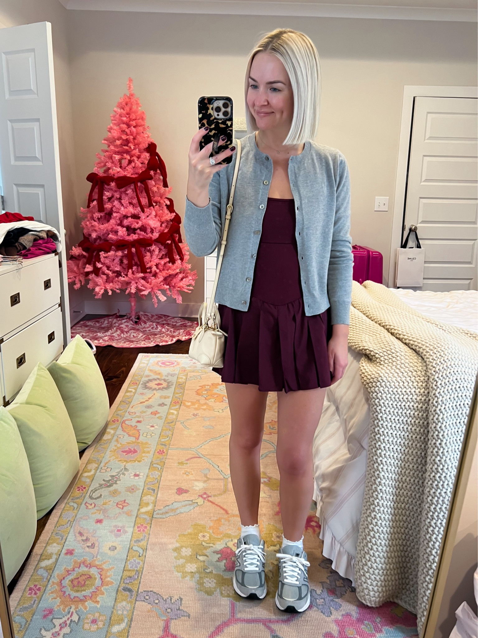 Swing of things skortsie (size: small, I sized up one per reviews) / gray cardigan / new balance sneakers / ruffle socks / casual fall outfit 

#LTKStyleTip #LTKActive #LTKSeasonal