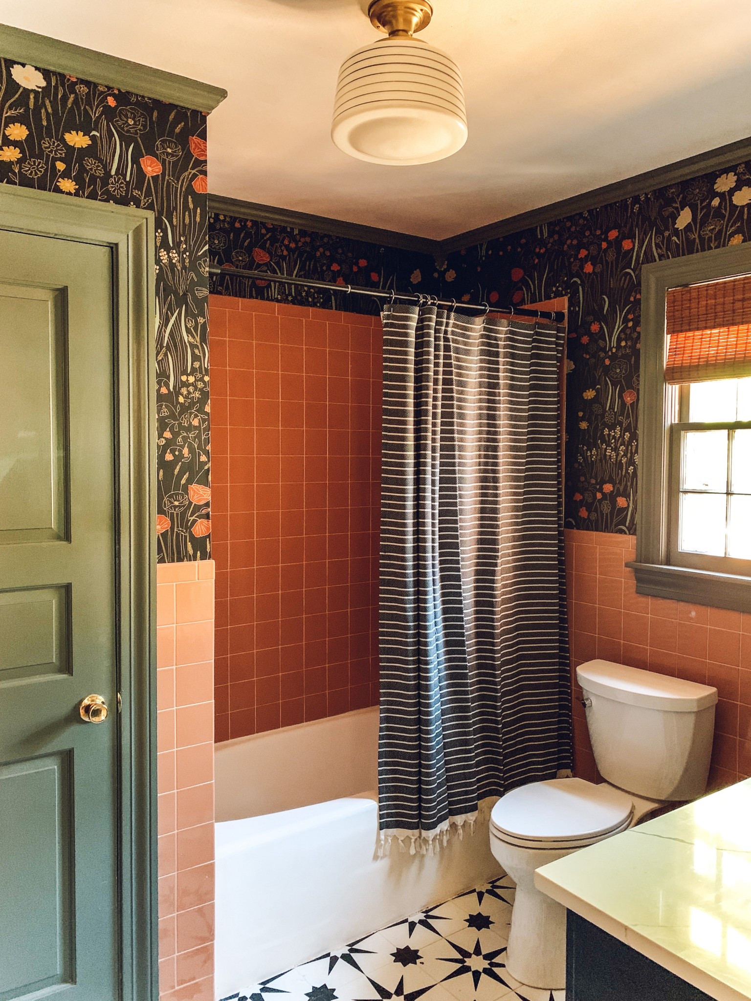 Vintage tile + wallpaper bathroom 

#LTKHome