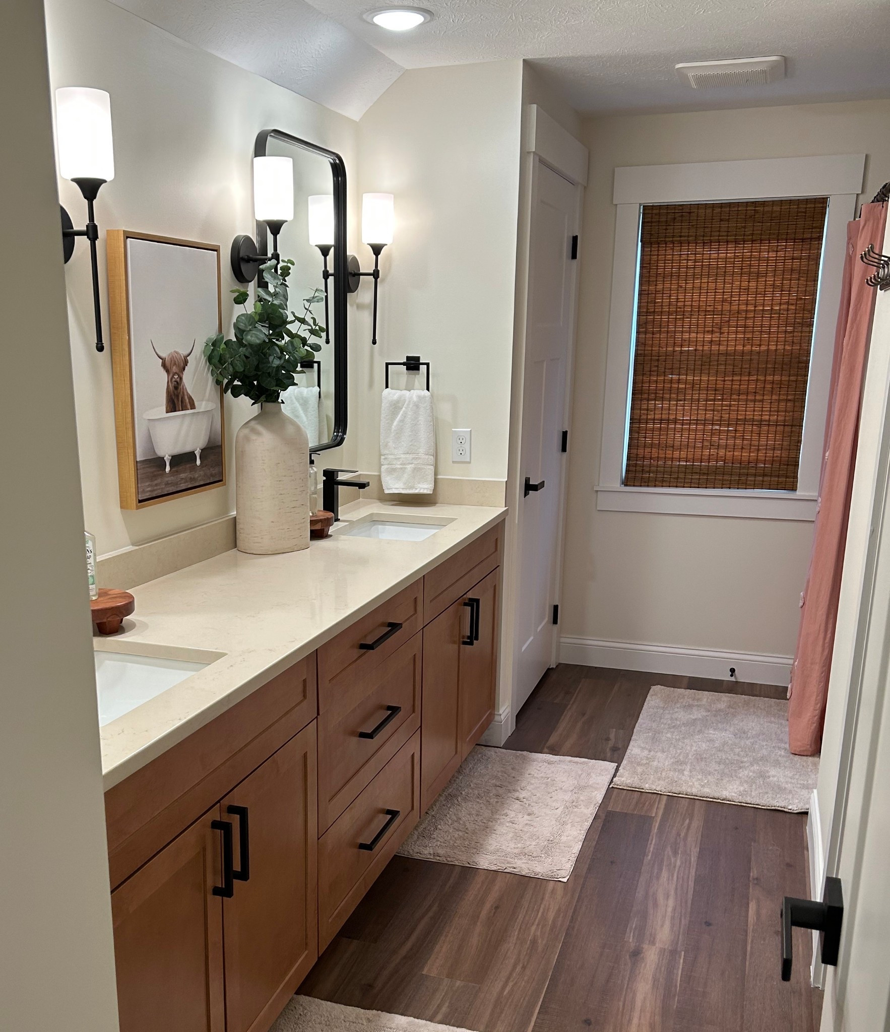Serene modern farmhouse vibes at our Lake House rental bathroom! 