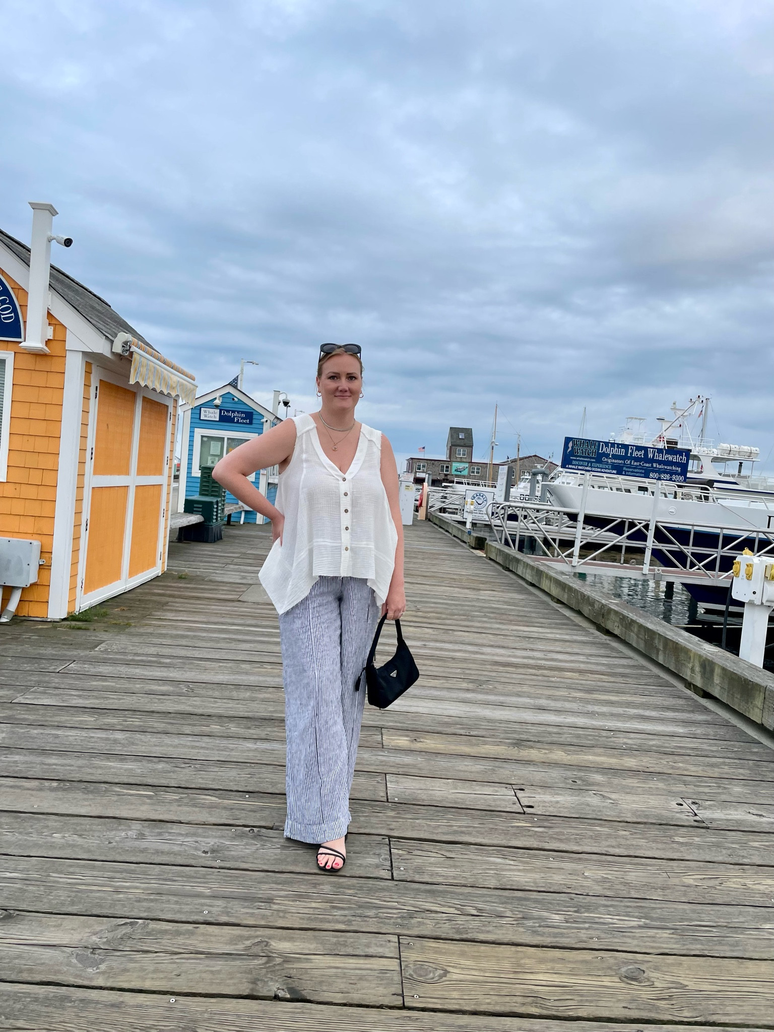 Linen pants, stripped linen pants, Prada bag, nylon prada bag, oval sunglasses, oval sunglasses, black summer sandals  Easy summer outfit inspo  

#LTKFindsUnder50 #LTKMidsize #LTKStyleTip