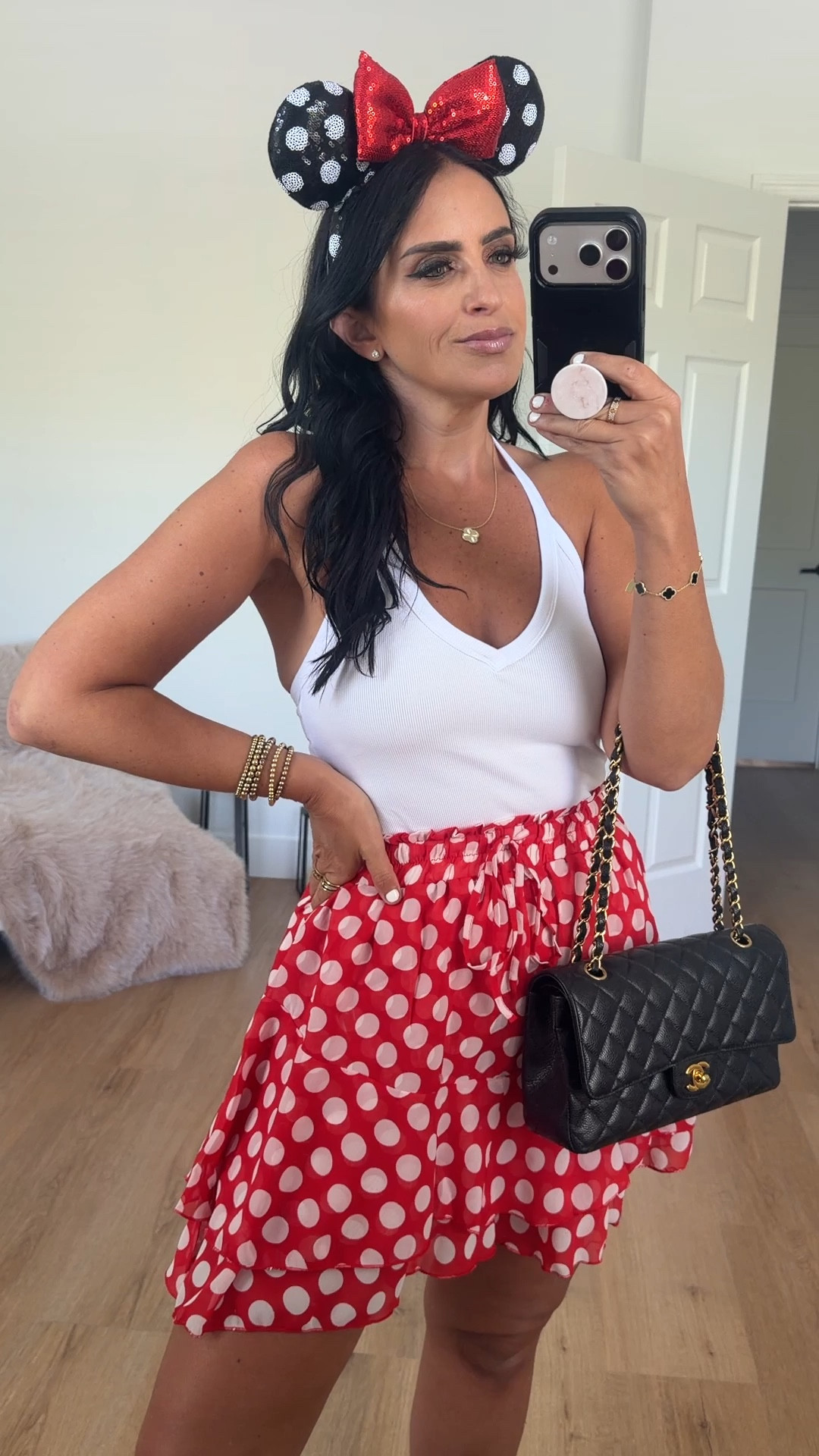 V neck tank with built in bra wearing size medium from Amazon

Red polka dot mini skirt skort wearing size medium. A good Disney park outfit 