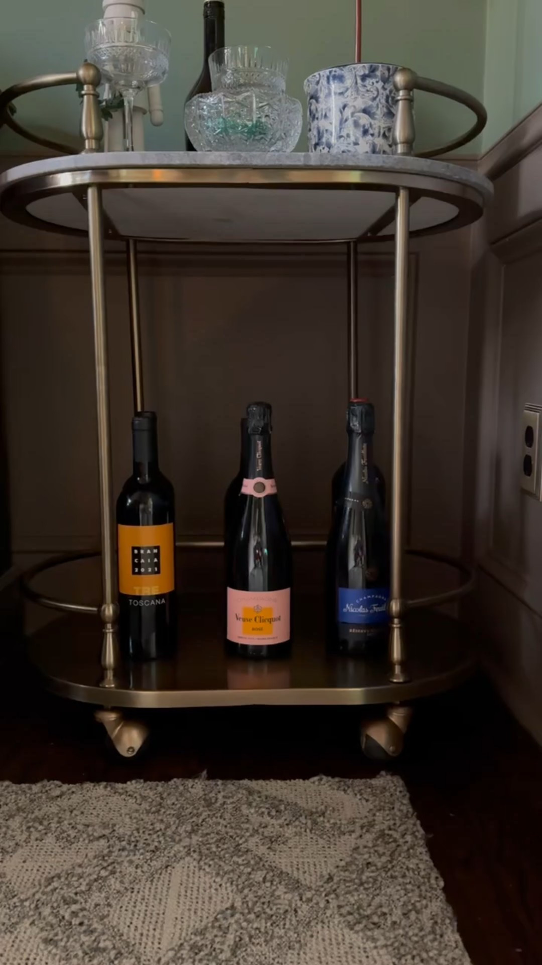 A well-styled bar cart never goes out of style ✨ This Hearth & Hand™ marble-top bar cart from Target is layered with champagne and wine bottles, etched coupe glasses, crystal serving bowls, and a blue & white ceramic vessel for that collected, classic look. Functional, beautiful, and perfect for entertaining or everyday styling.

#targethome #barcartdecor #homeentertaining #timelessstyle #decorinspo #eanesinteriors


#LTKOver40 #LTKvlog #LTKHome