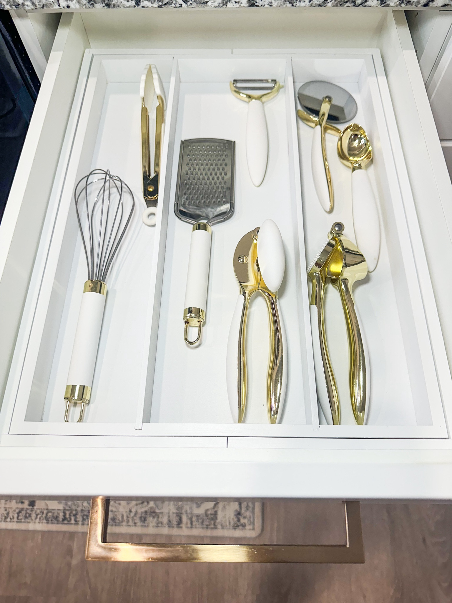 OK, these gold and white kitchen tools actually make me want to eat in more. And I love that this expandable bamboo divider fits them perfectly! 

#homeorganization

#LTKHome #LTKFindsUnder50 #LTKFamily