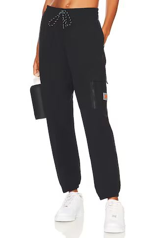 Nike NSW Cargo Sweatpant in Black & Safety Orange from Revolve.com | Revolve Clothing (Global)