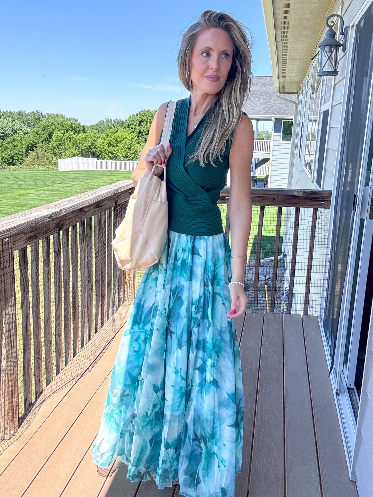 This green top along with this green floral print skirt are so beautiful! 💚 Wearing a small in both. 

Green floral print maxi skirt, green wrap top, mom style, what to wear this summer, wedding guest outfit inspo, church outfit idea, rose colored bag, spring fashion, summer styles

#LTKootd #LTKOver40 #LTKMidsize