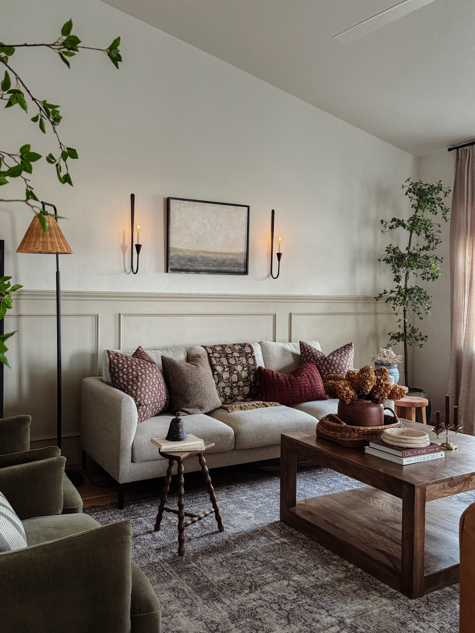 Living room inspo, living room ideas, leather congac sofa, black metal cabinet, Target home decor, budget friendly, handblock throw blanket, vintage throw, table decor, black wall sconces

#LTKfindsunder50 #LTKhome #LTKstyletip