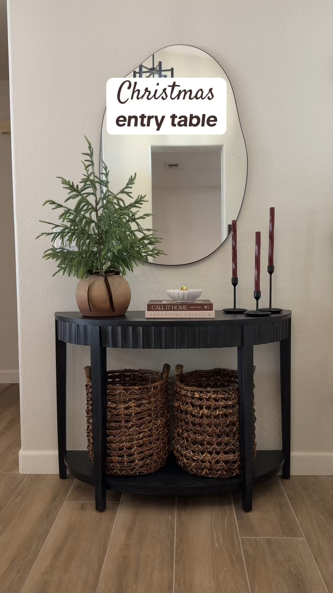Entryway table styling for Christmas! 🎄 Easing into the holiday decor with these subtle Christmas touches. 

This Norfolk tree and pot are from Hobby Lobby, linked some similars. 

These twisted red taper candles have a shimmer to them, making them ever more beautiful! And the addition of gold bells add the perfect festive touch✨

•
•
Christmas decor, Christmas decorating inspo, Christmas decor ideas, Christmas tree, Norfolk pine tree, neutral Christmas, classic Christmas, nostalgia Christmas, Ralph Lauren christmas, decor ideas, cozy home, decorating ideas, foyer decor, entry table, console table styling 

#LTKHome #LTKHoliday #LTKSeasonal